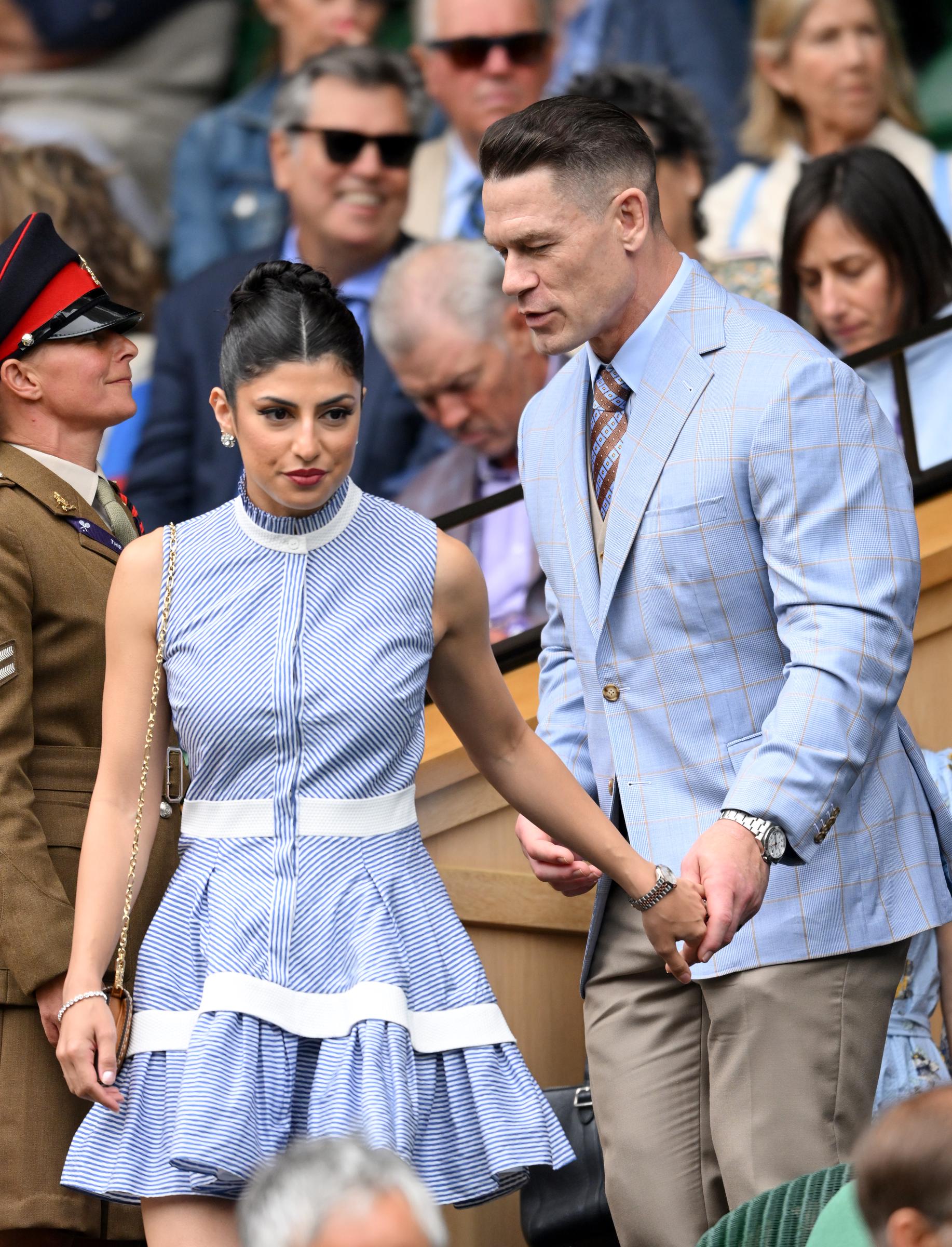 John Cena and Shay Shariatzadeh attend Day Three of the Wimbledon Tennis Championships at the All England Lawn Tennis and Croquet Club on July 2, 2025, in London, England. | Source: Getty Images