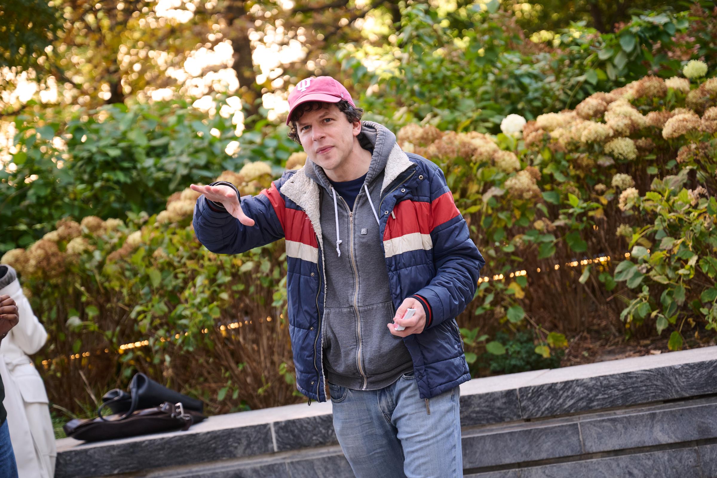 Jesse Eisenberg performs a magic trick ahead of the release of "Now You See Me: Now You Don't" at Hudson Yards on October 25, 2025 in New York City. | Source: Getty Images