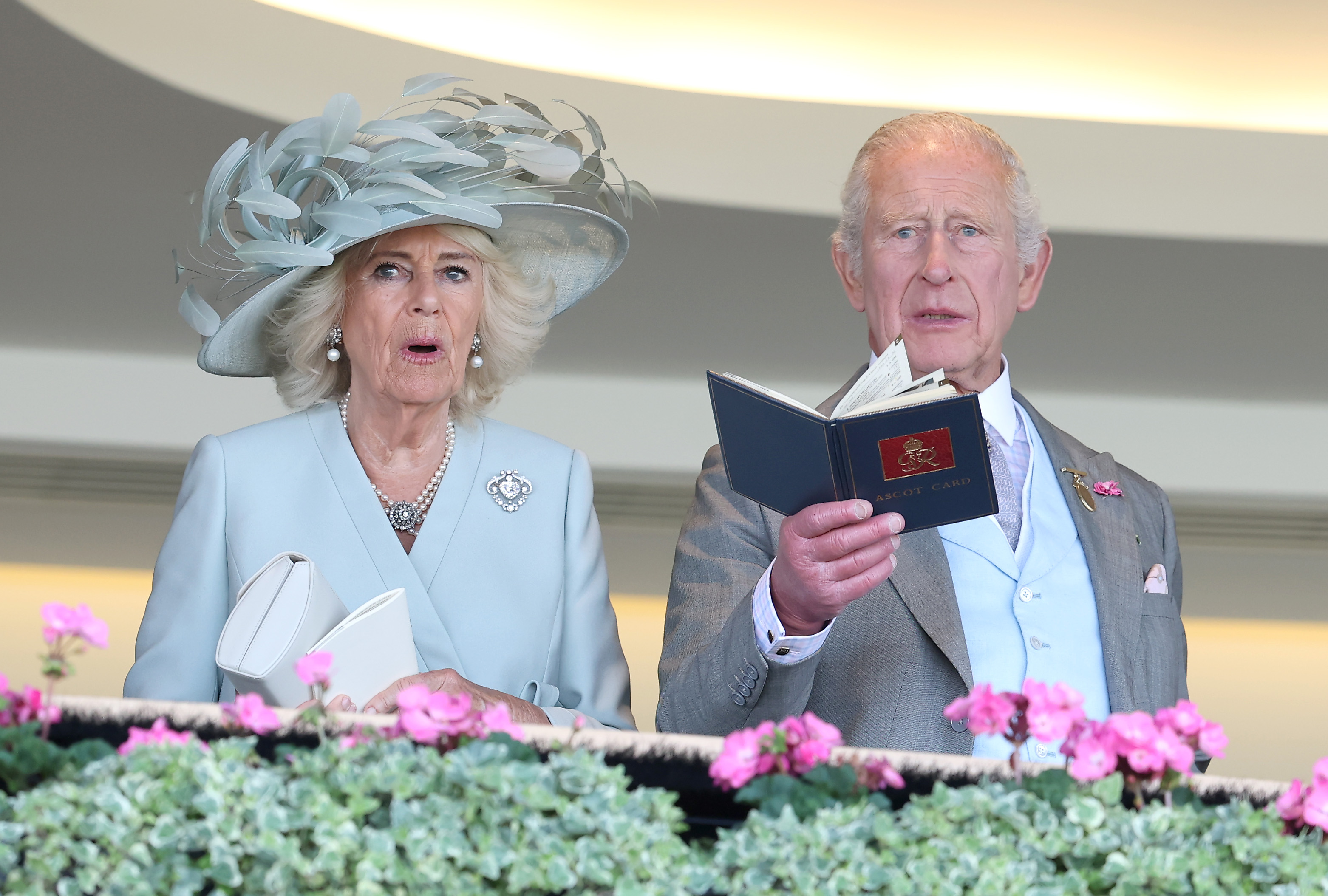 Queen Camilla and King Charles III react as they attend day one of Royal Ascot at Ascot Racecourse on June 17, 2025 in Ascot, England | Source: Getty Images