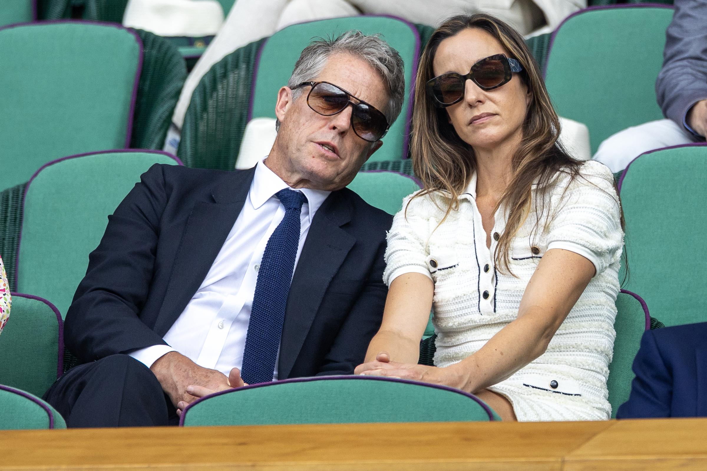 Hugh Grant and Anna Eberstein during the Wimbledon Lawn Tennis Championships on July 9, 2025, in London, England. | Source: Getty Images