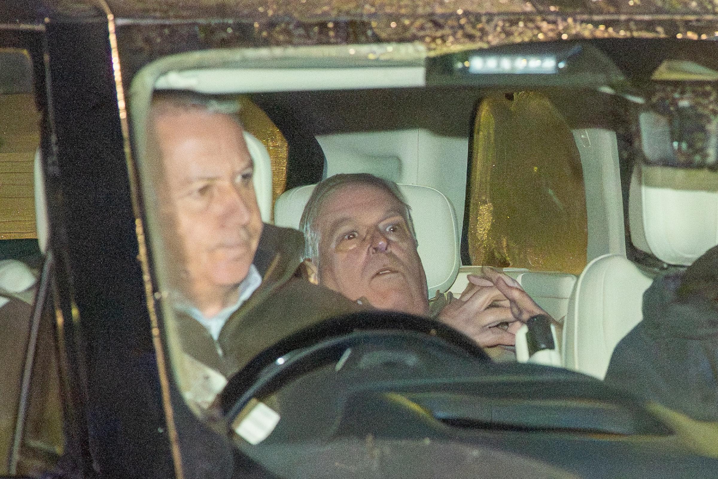 Andrew Mountbatten-Windsor is seen being driven away from a police station following his arrest on suspicion of misconduct in a public office. The brother of King Charles was seen sat in the back of a Range Rover as he left the Police Investigation Centre on February 19, 2026 in Aylsham, Norfolk, United Kingdom. | Source: Getty Images