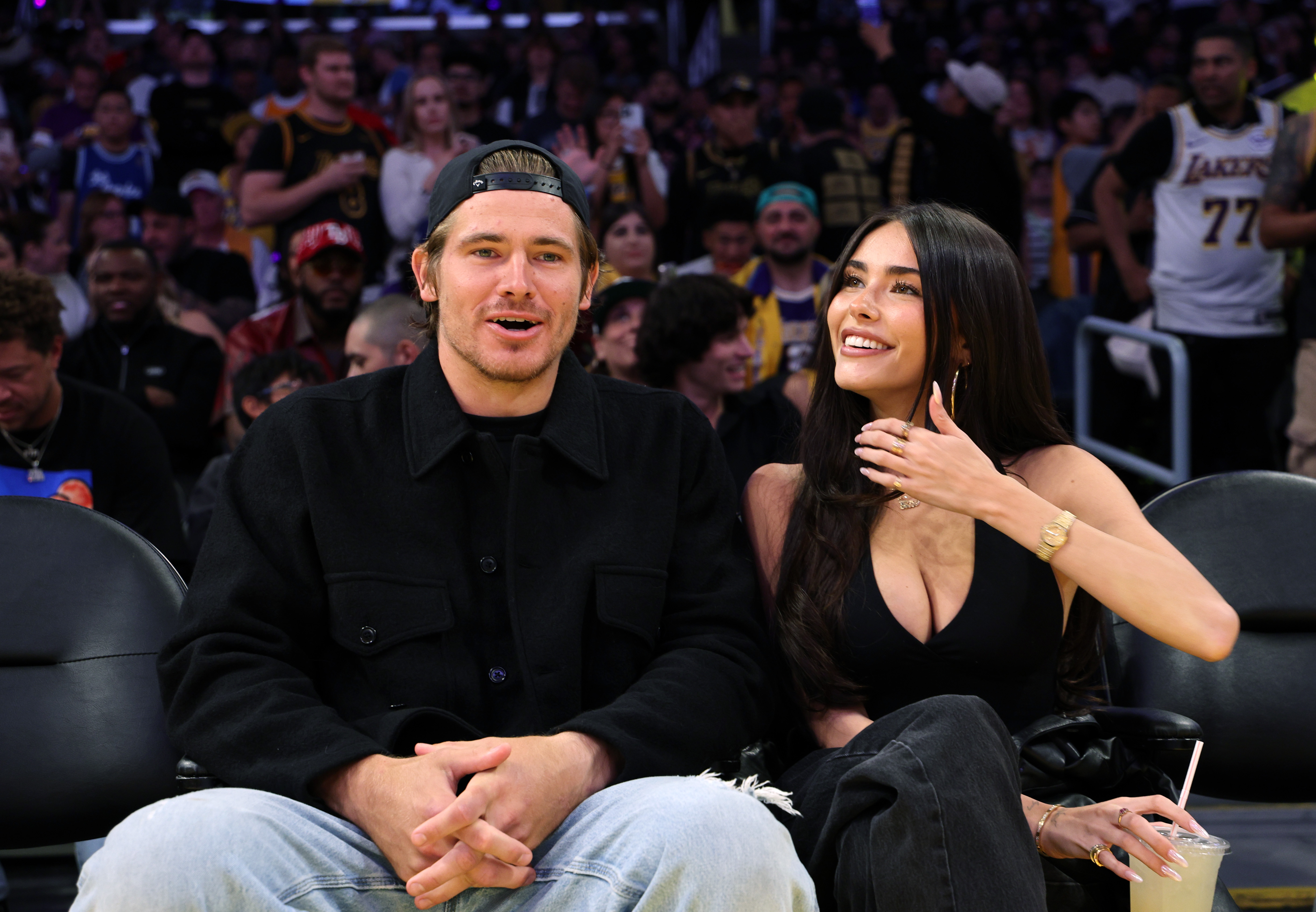 Justin Herbert and Madison Beer during a basketball game between Los Angeles Lakers and Minnesota Timberwolves at Crypto.com Arena on October 24, 2025, in Los Angeles, California. | Source: Getty Images