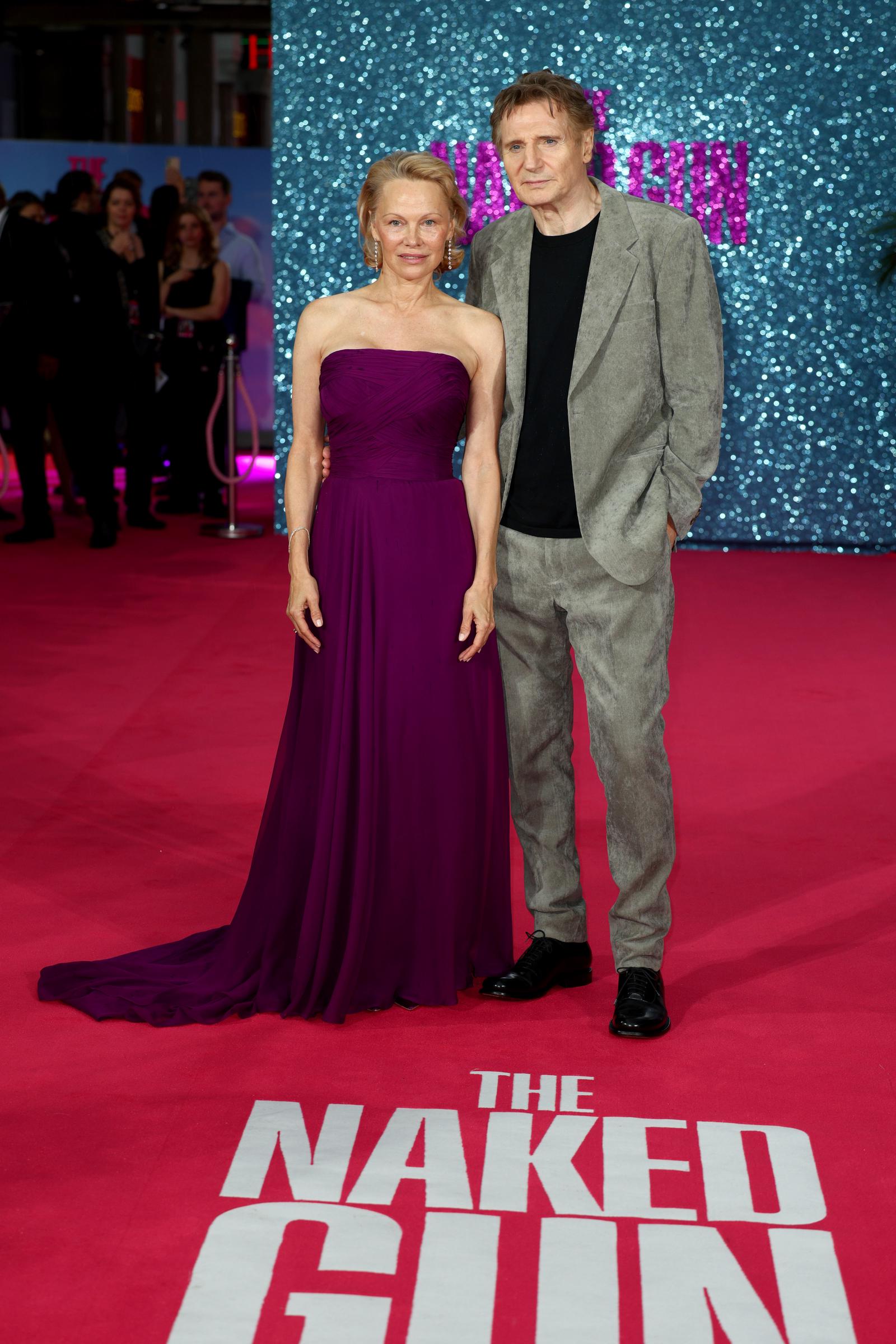Pamela Anderson and Liam Neeson attend "The Naked Gun" UK Premiere at Cineworld Leicester Square on July 22, 2025, in London, England. | Source: Getty Images