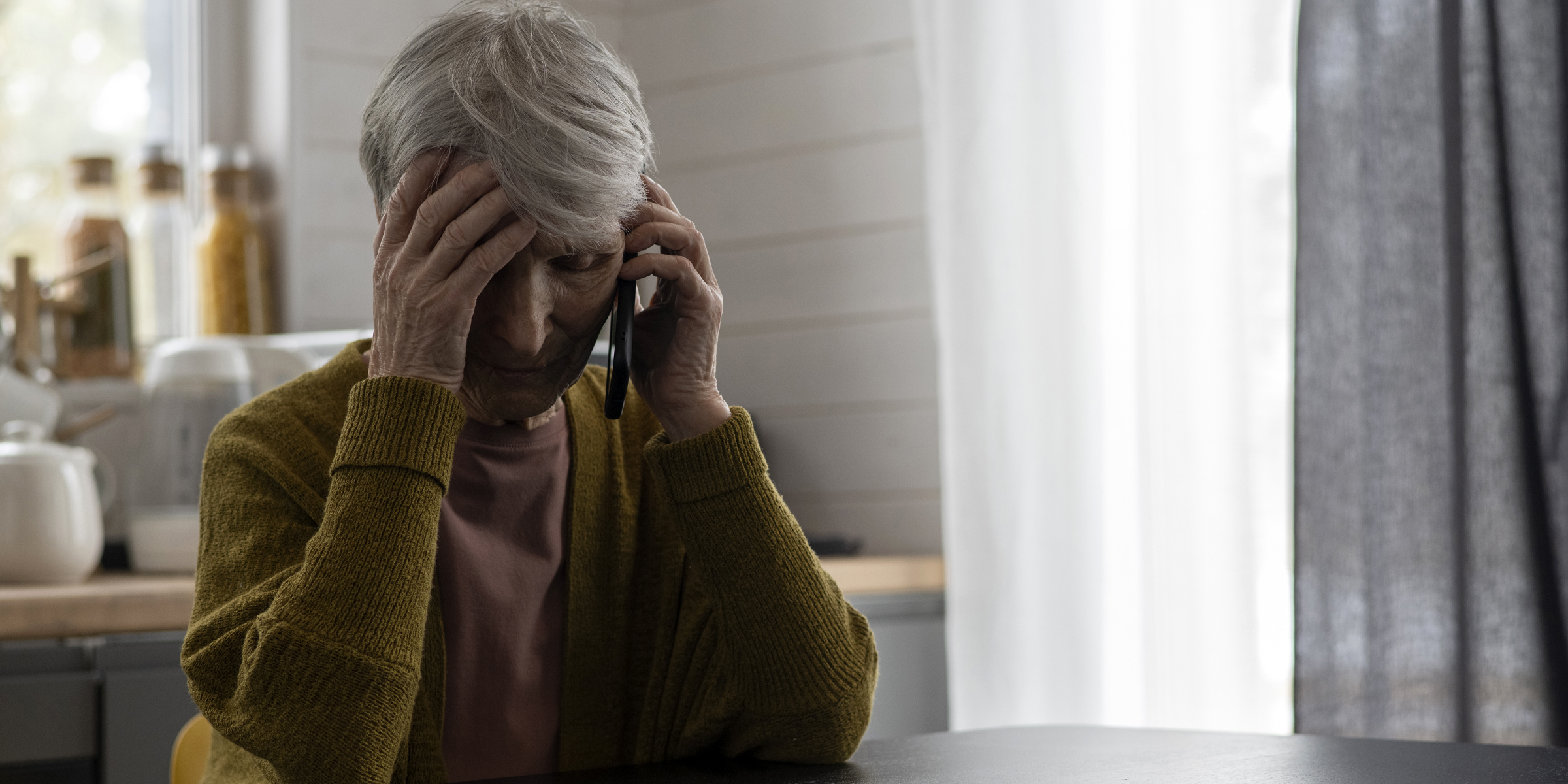 An upset woman on a call | Source: Freepik