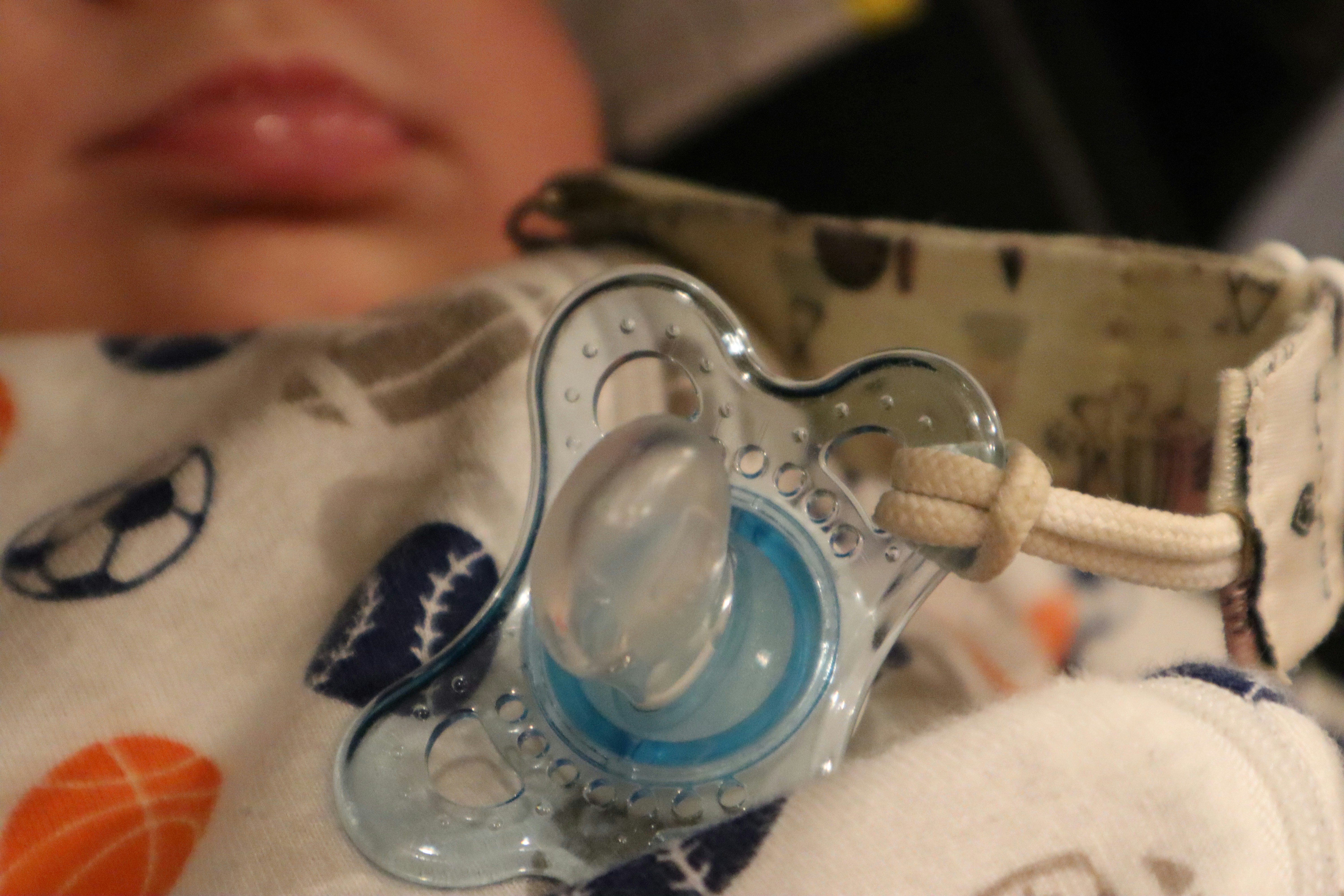 A pacifier on a baby | Source: Unsplash