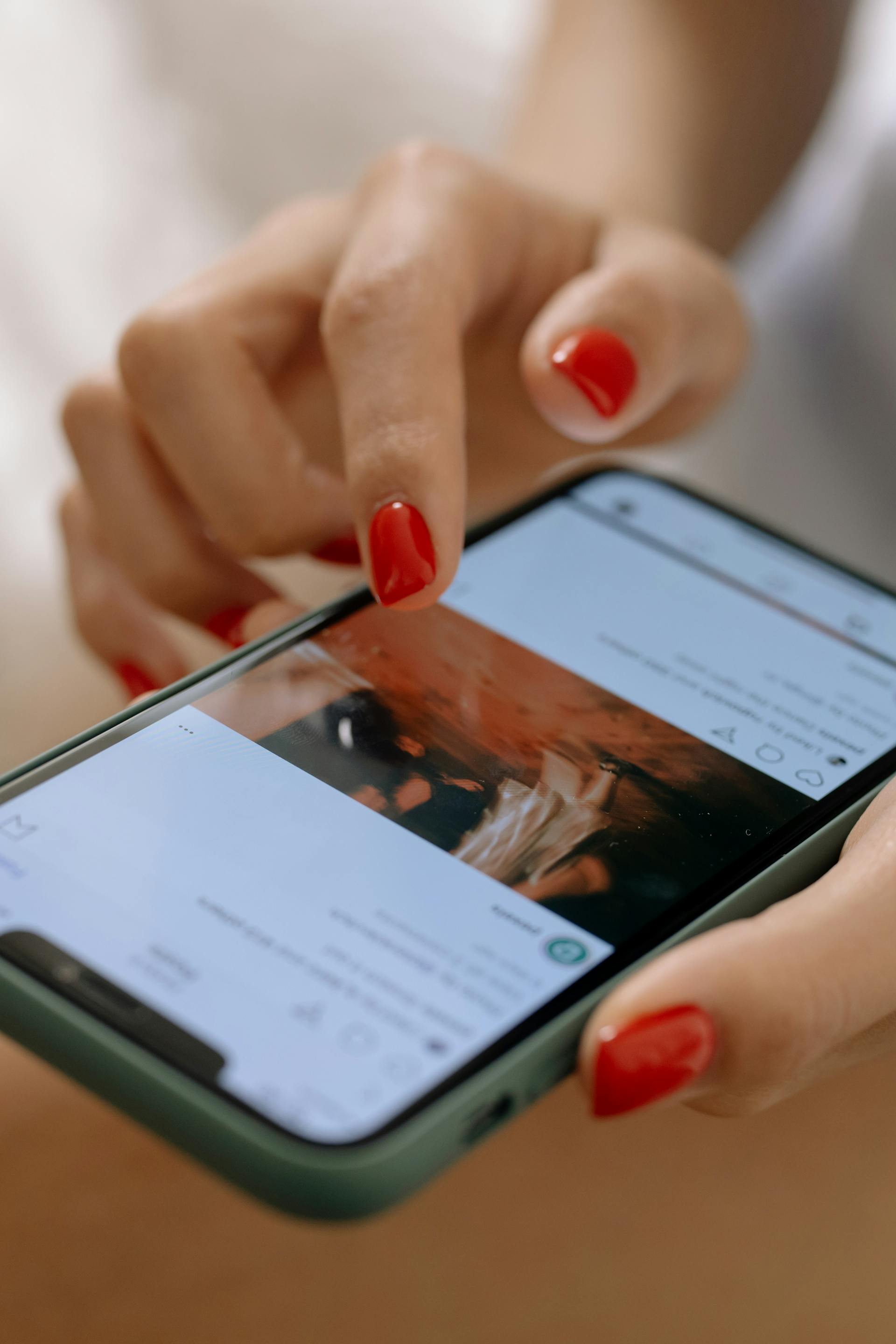 A woman scrolling Instagram feed | Source: Pexels
