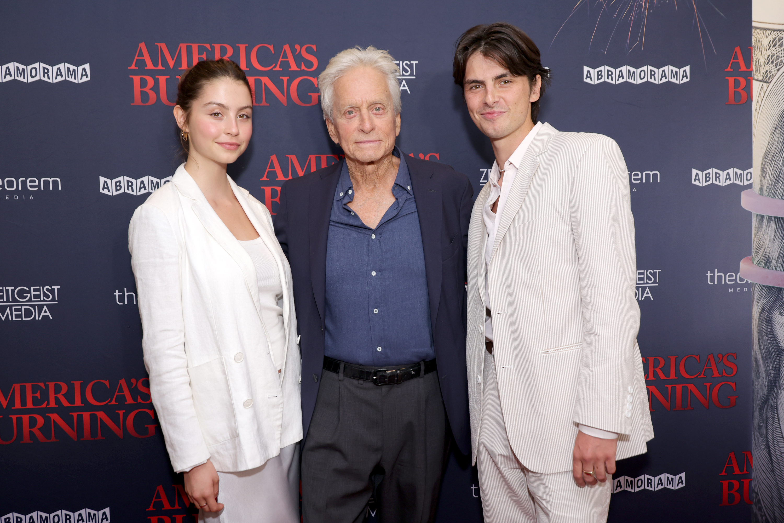 Michael Douglas and his children Carys Zeta Douglas and Dylan Michael Douglas attend an "America's Burning" New York screening at DGA Theater on July 10, 2024 in New York City. | Source: Getty Images