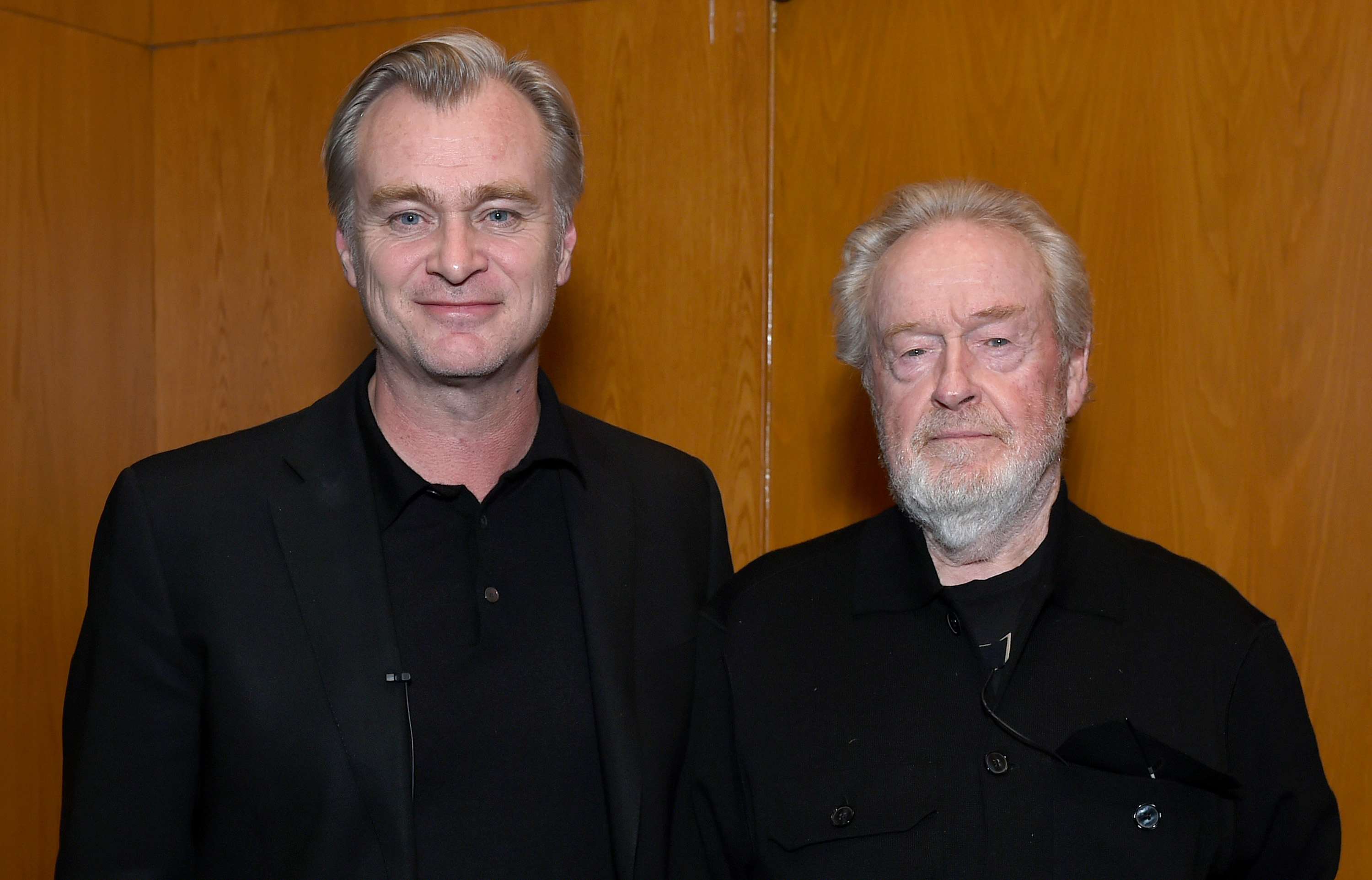 Christopher Nolan and Ridley Scott attend a "Gladiator II" conversation with Director Ridley Scott and Director Christopher Nolan in Los Angeles at the DGA Theater Complex on December 10, 2024, in Los Angeles, California. | Source: Getty Images
