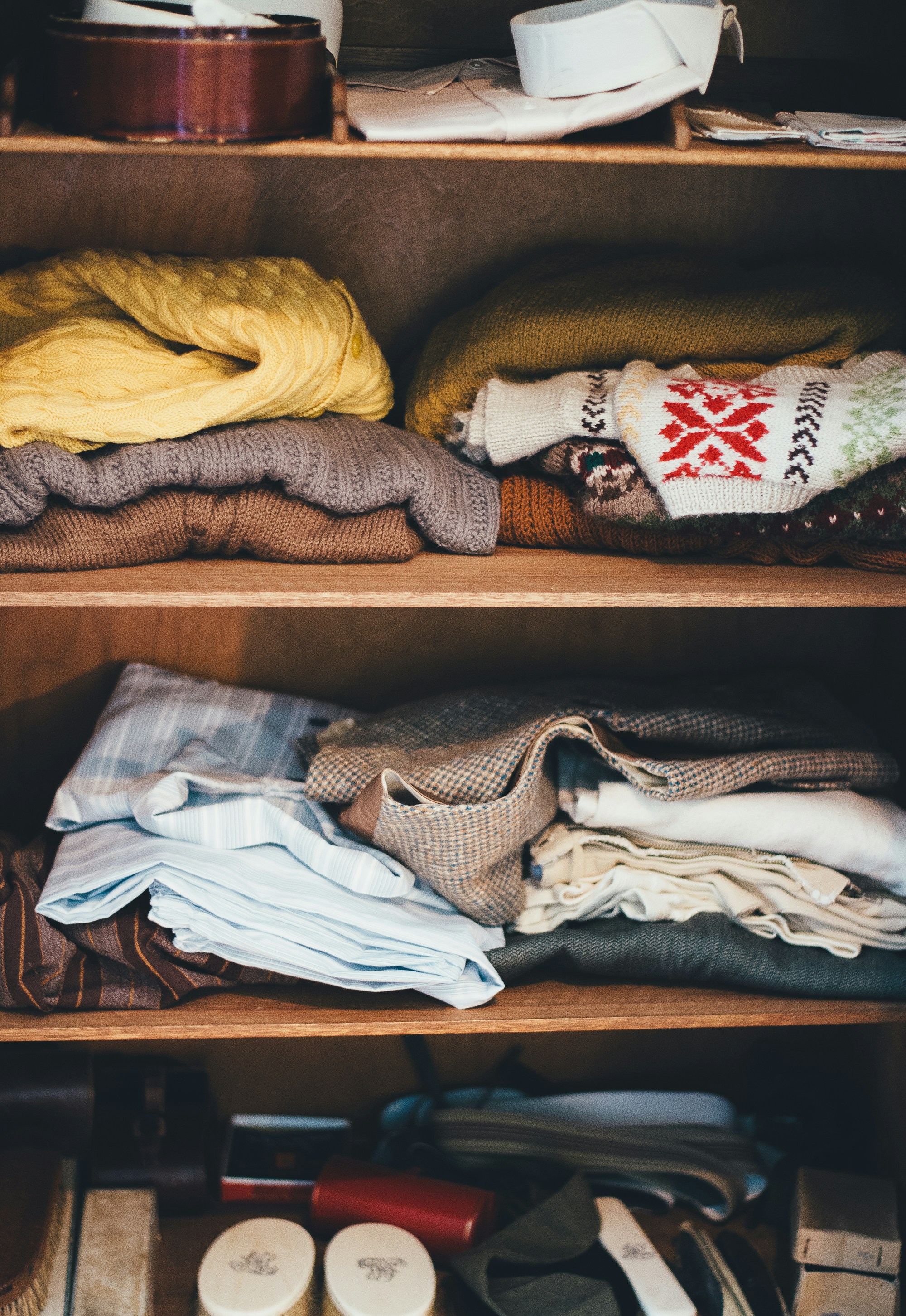 Folded clothing in a closet | Source: Unsplash