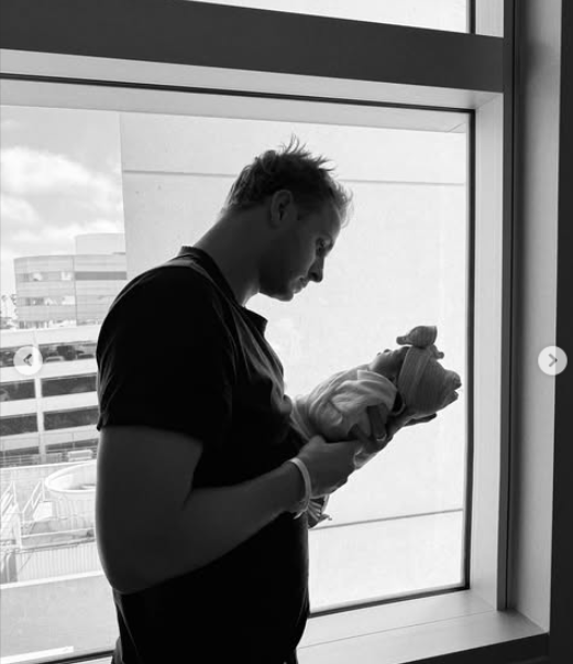 Jared Goff holding his newborn daughter, dated July 2025 | Source: Instagram/christengoffandjaredgoff