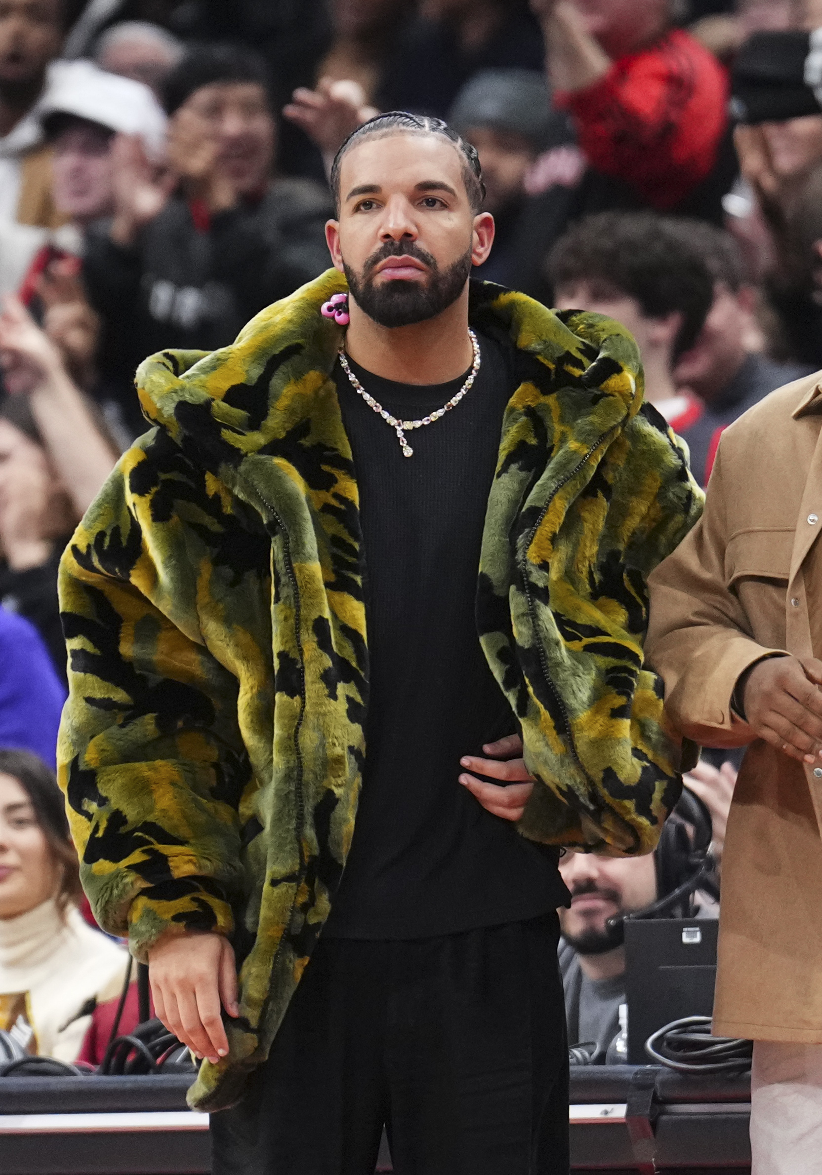 Drake watches on as the Sacramento Kings play the Toronto Raptors during the second half of their basketball game at the Scotiabank Arena on November 2, 2024, in Toronto, Ontario, Canada. | Source: Getty Images