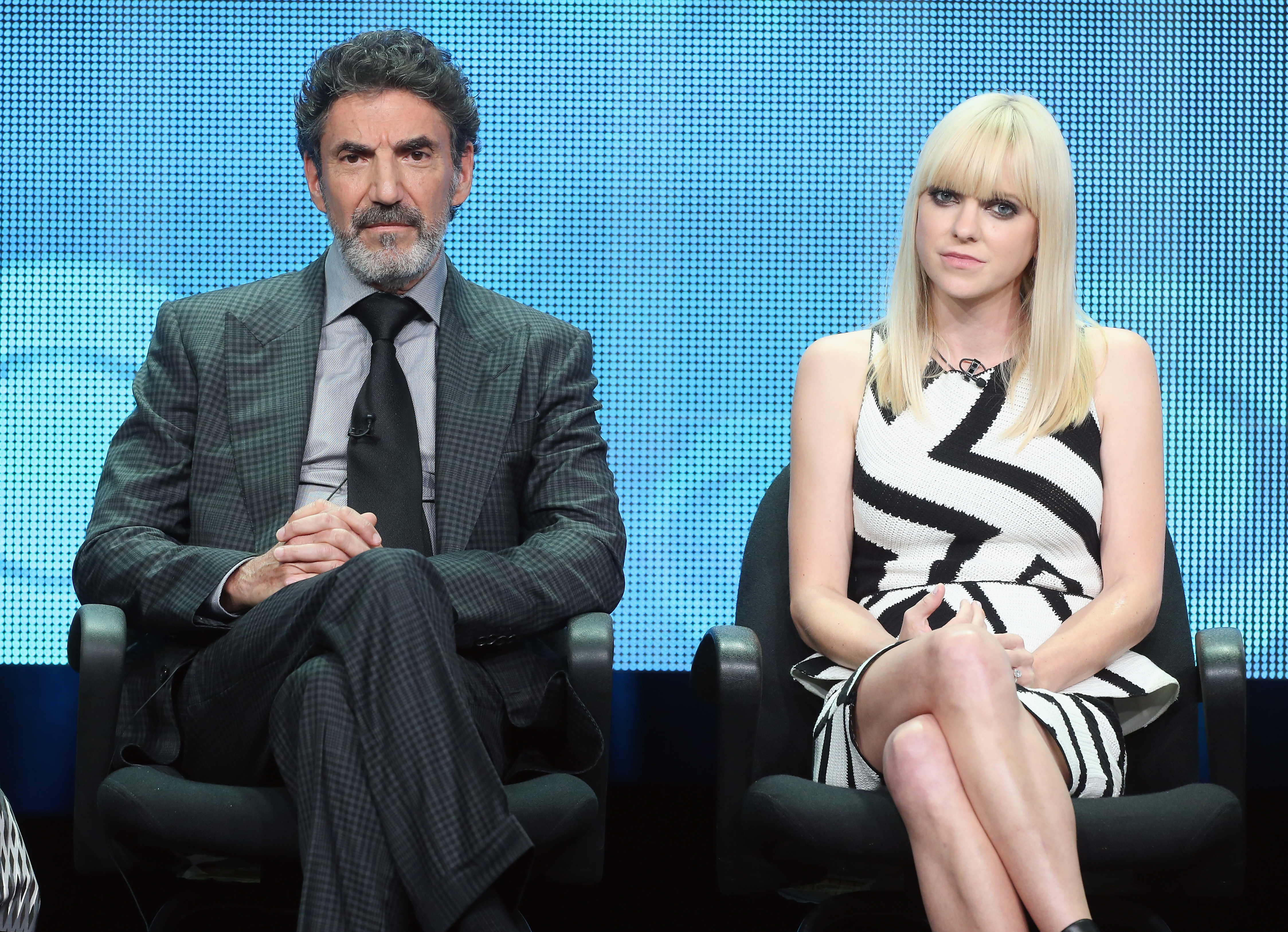 Chuck Lorre and Anna Faris speak onstage during the "Mom" panel discussion at the CBS, Showtime and The CW portion of the 2013 Summer Television Critics Association tour at the Beverly Hilton Hotel on July 29 in Beverly Hills, California. | Source: Getty Images
