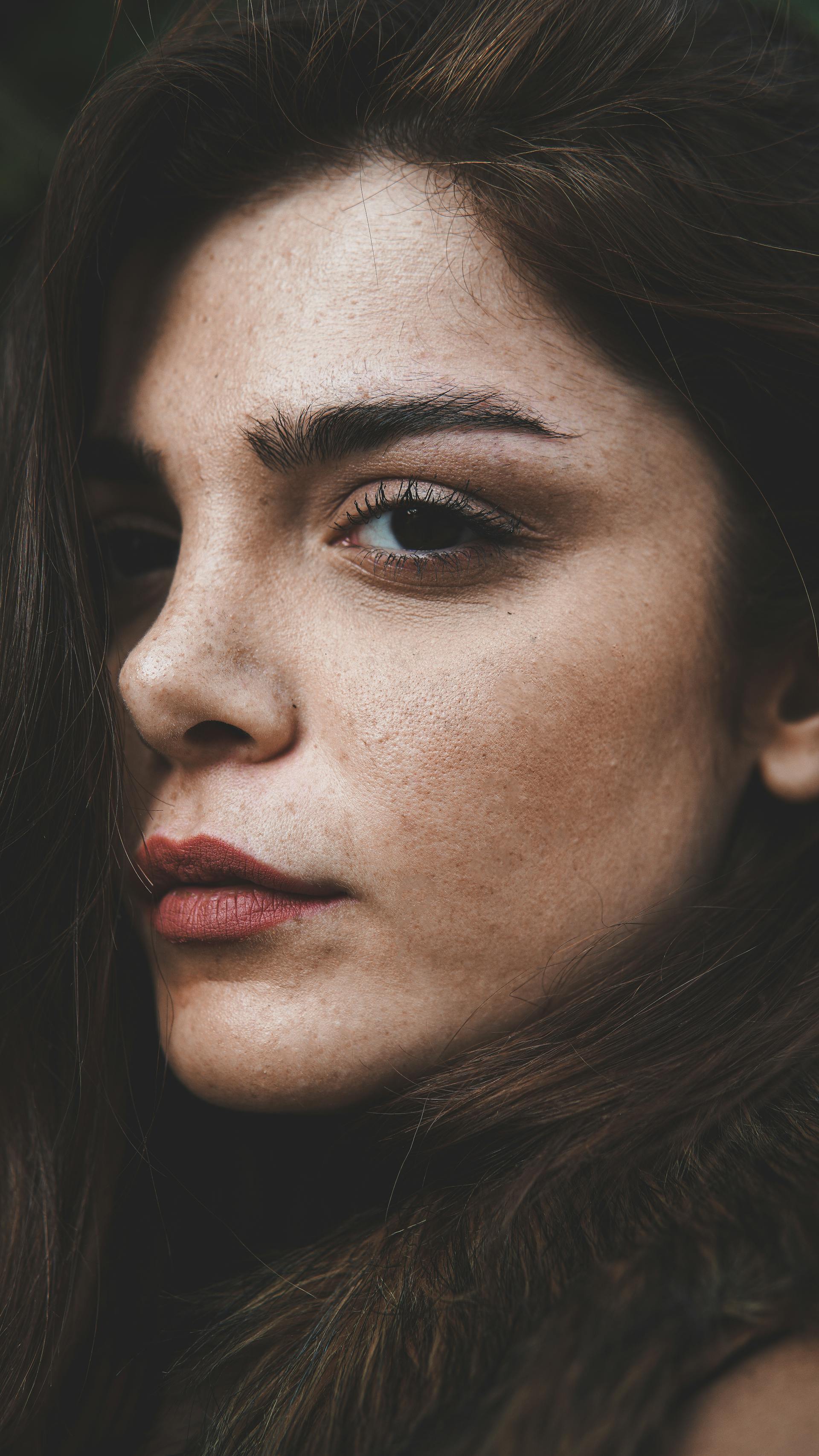 A close-up shot of a woman's face | Source: Pexels