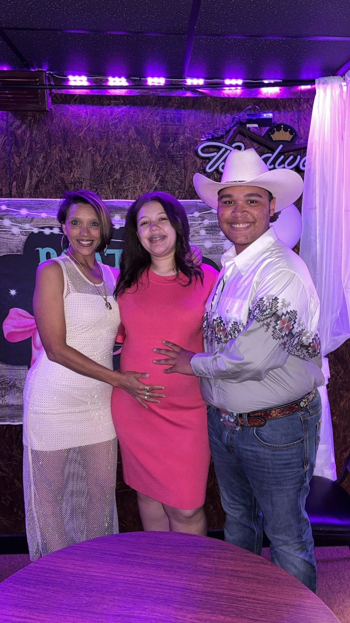 Hattie Sullivan, Paris Reed, and Triston Harper pose for a photo, posted on May 9, 2025. | Source: Facebook/Hattie Sullivan