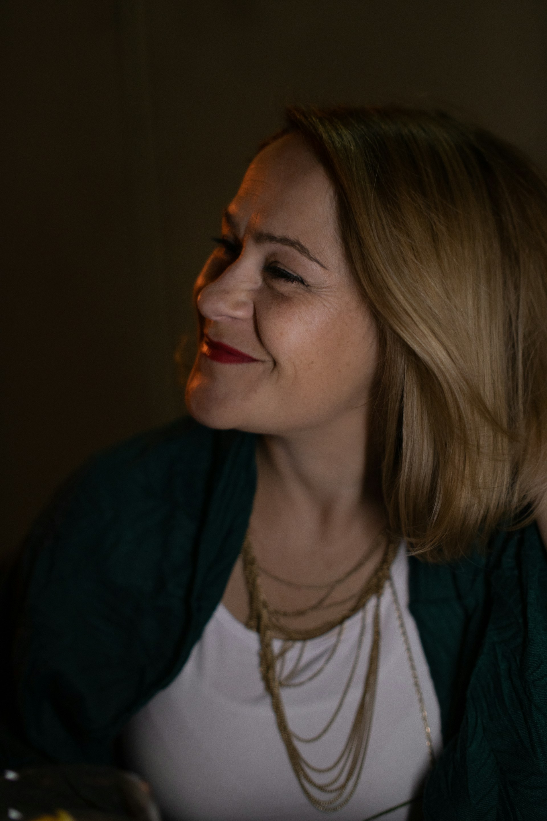 A woman smiling at someone | Source: Unsplash