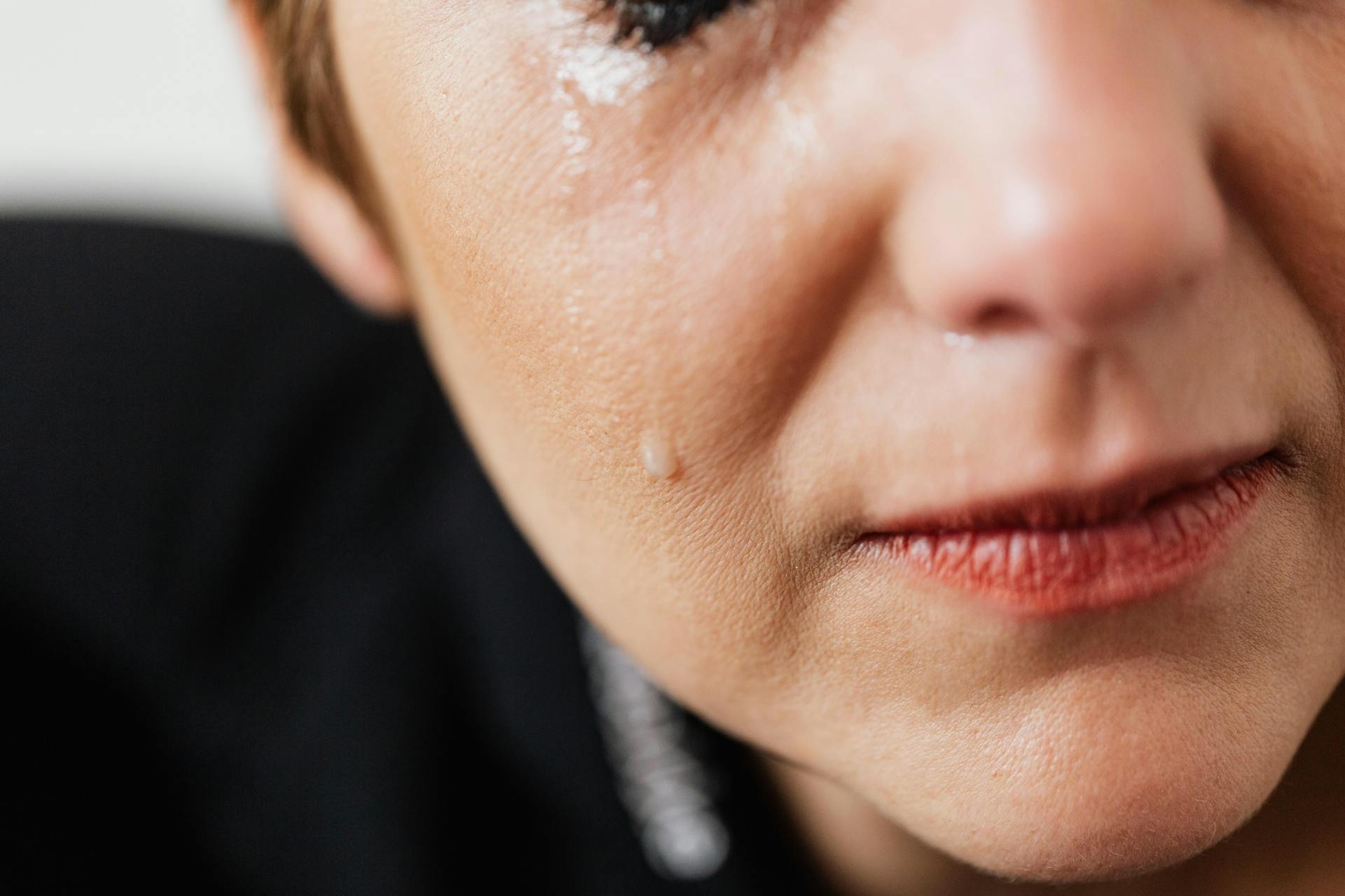 A tear running down a woman's cheek | Source: Pexels
