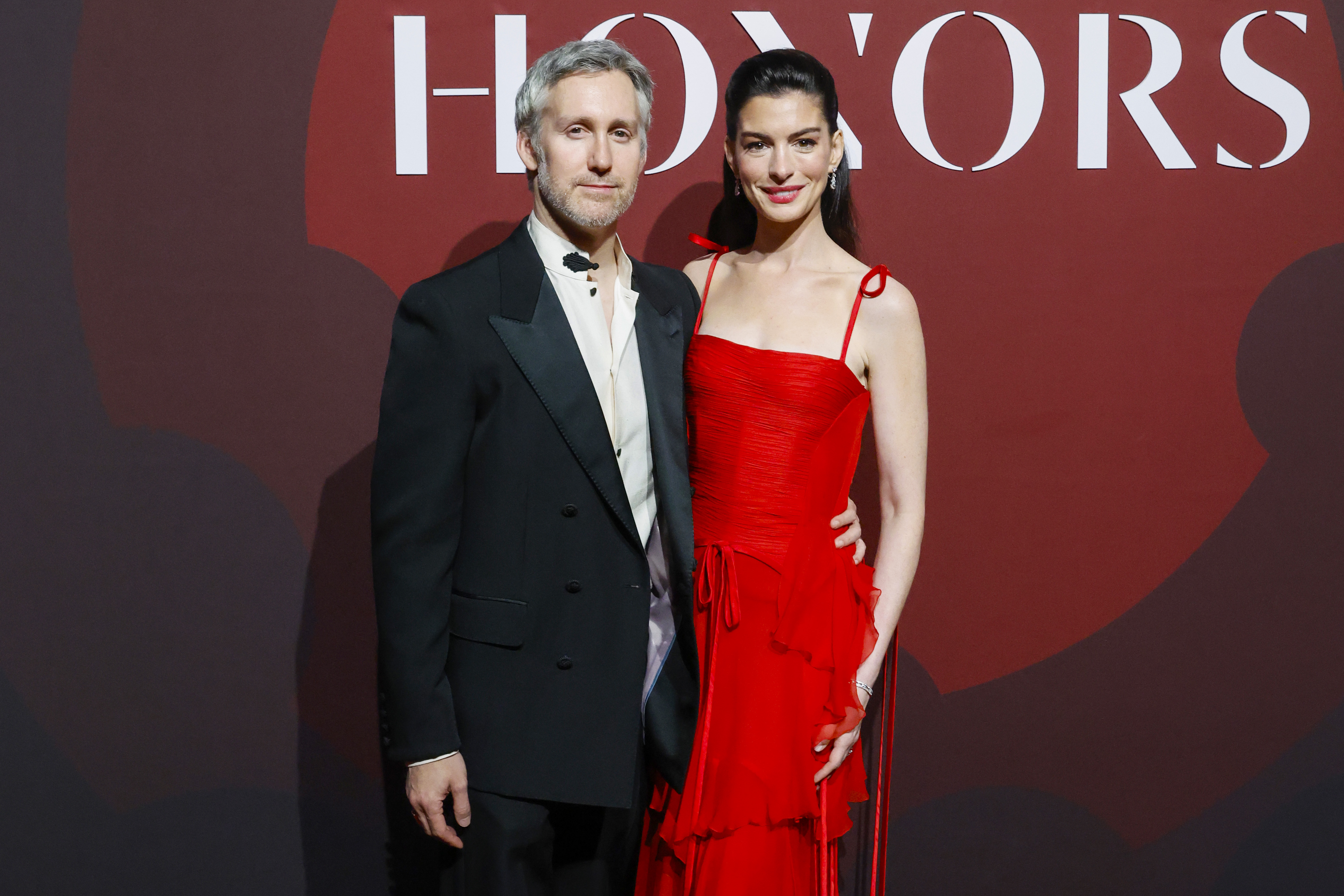 Adam Shulman and Anne Hathaway attend the 2025 WWD Honors at Cipriani South Street on October 28, 2025 in New York City. | Source: Getty Images