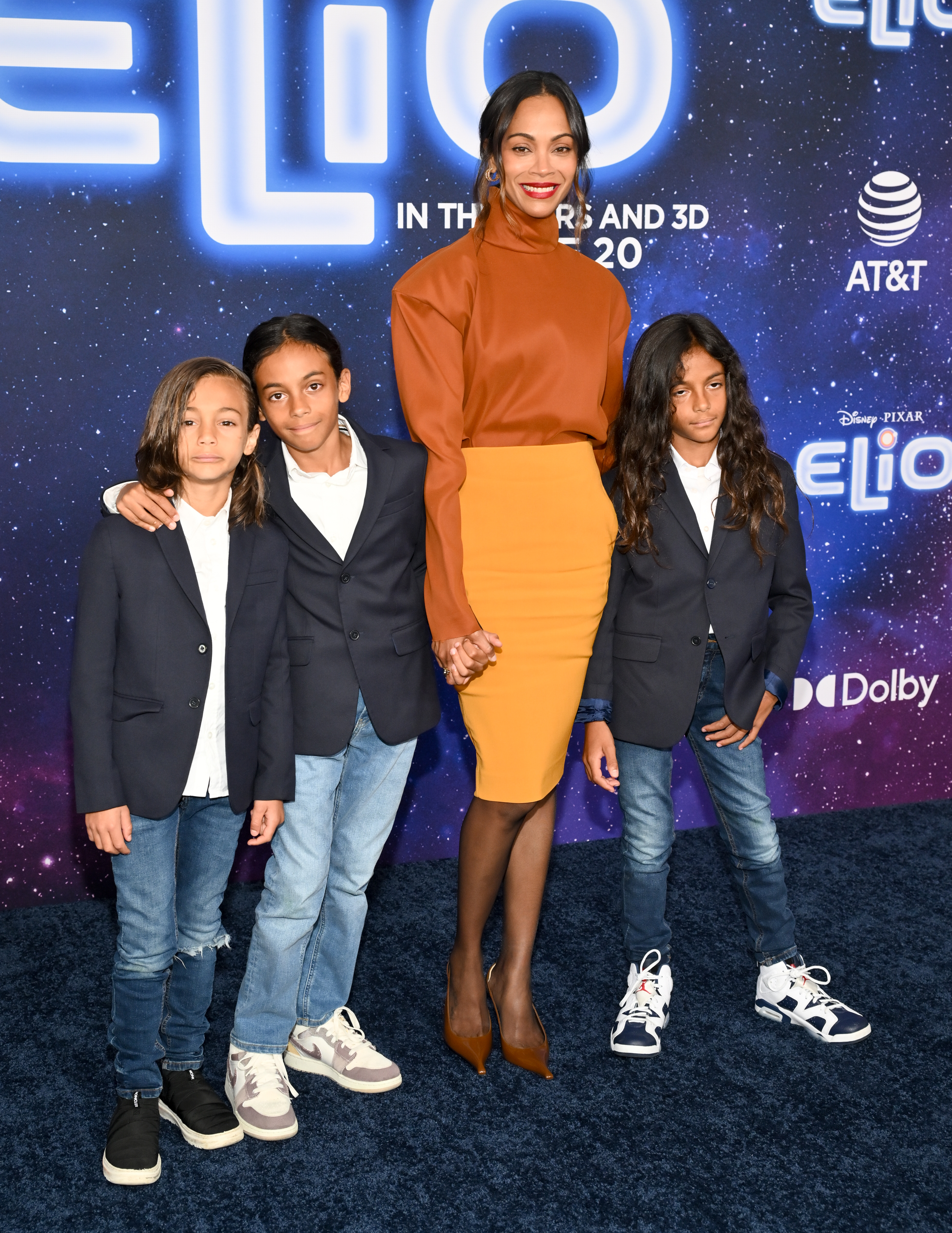 Zoe Saldana and her children, Cy Arido Perego, Bowie Ezio Perego and Zen Anton Hilario Perego attend the world premiere of Disney and Pixar's "Elio" at the El Capitan Theatre in Los Angeles on June 10, 2025 | Source: Getty Images