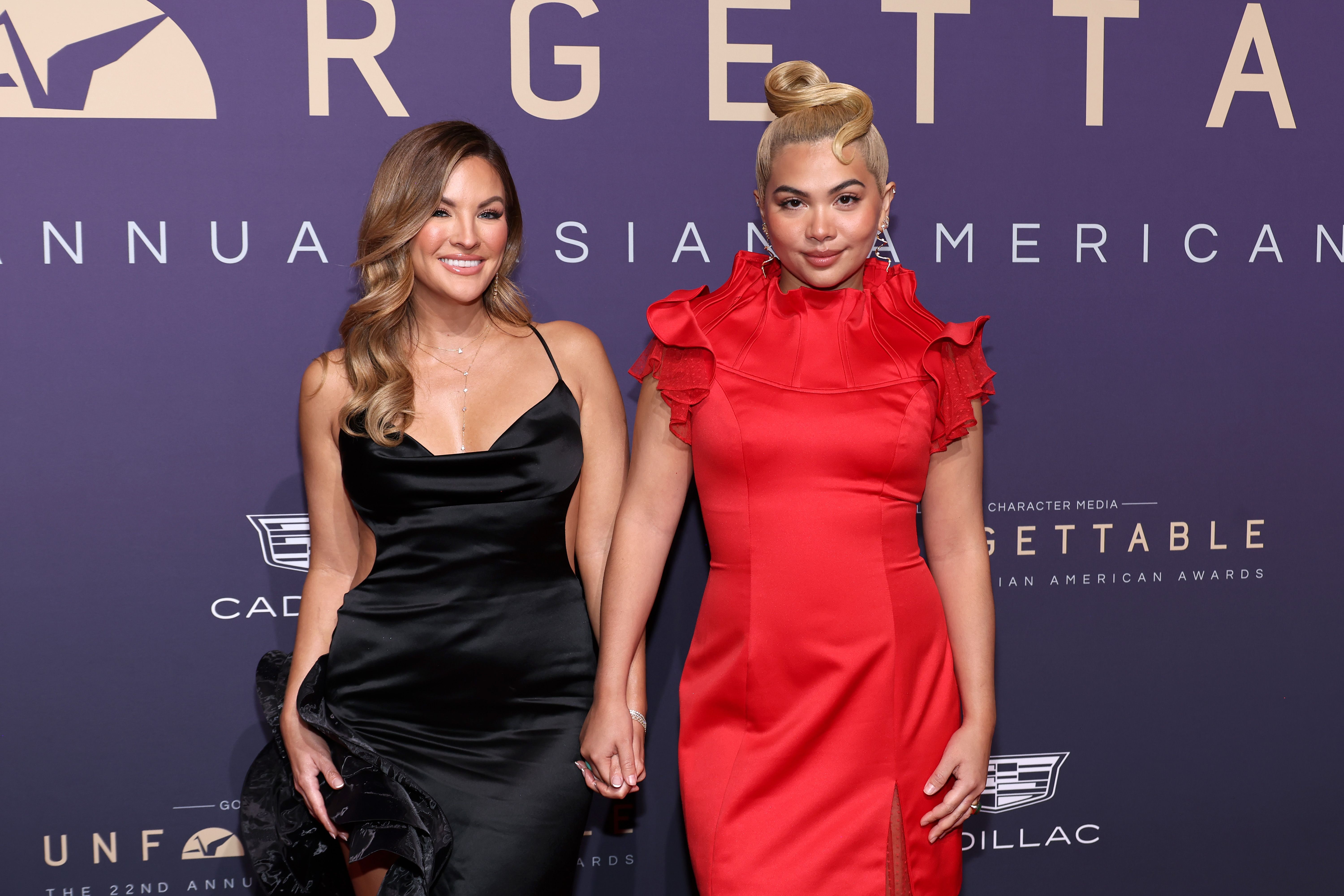 Becca Tilley and Hayley Kiyoko attend Unforgettable: The 22nd Annual Asian American Awards at The Beverly Hilton on December 14, 2024, in Beverly Hills, California. | Source: Getty Images