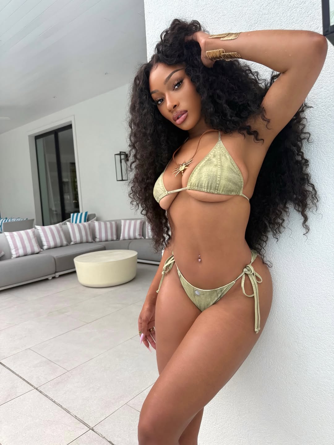 Megan Thee Stallion poses in a photo posted on July 9, 2025. | Source: Instagram/megantheestallion
