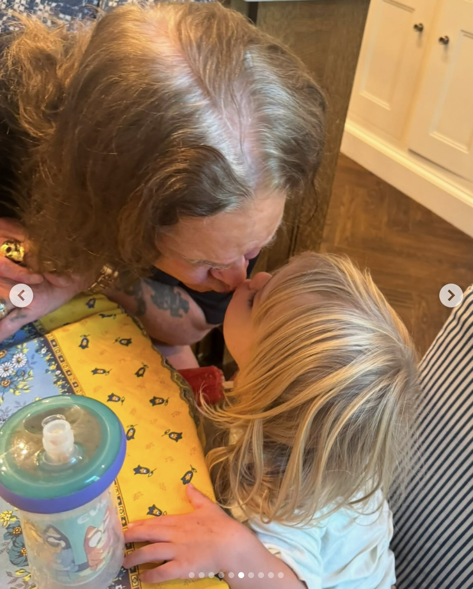 Ozzy Osbourne giving his grandchild a kiss on the lips, posted on August 3, 2025. | Source: Instagram/areeosbourne