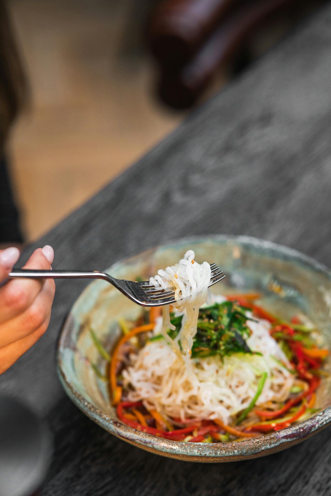 A person eating pasta | Source: Pexels