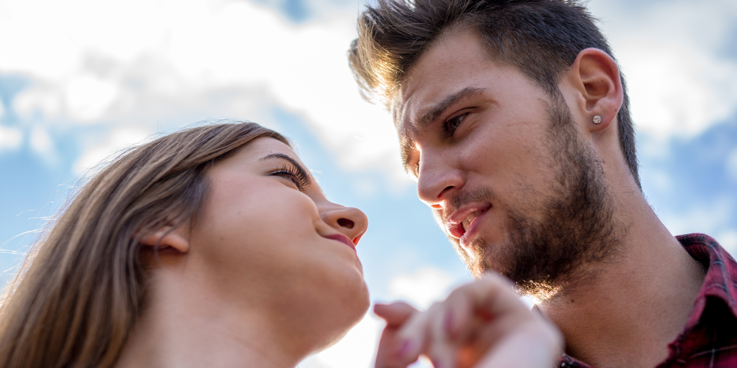 A cunning man staring at a woman | Source: Shutterstock