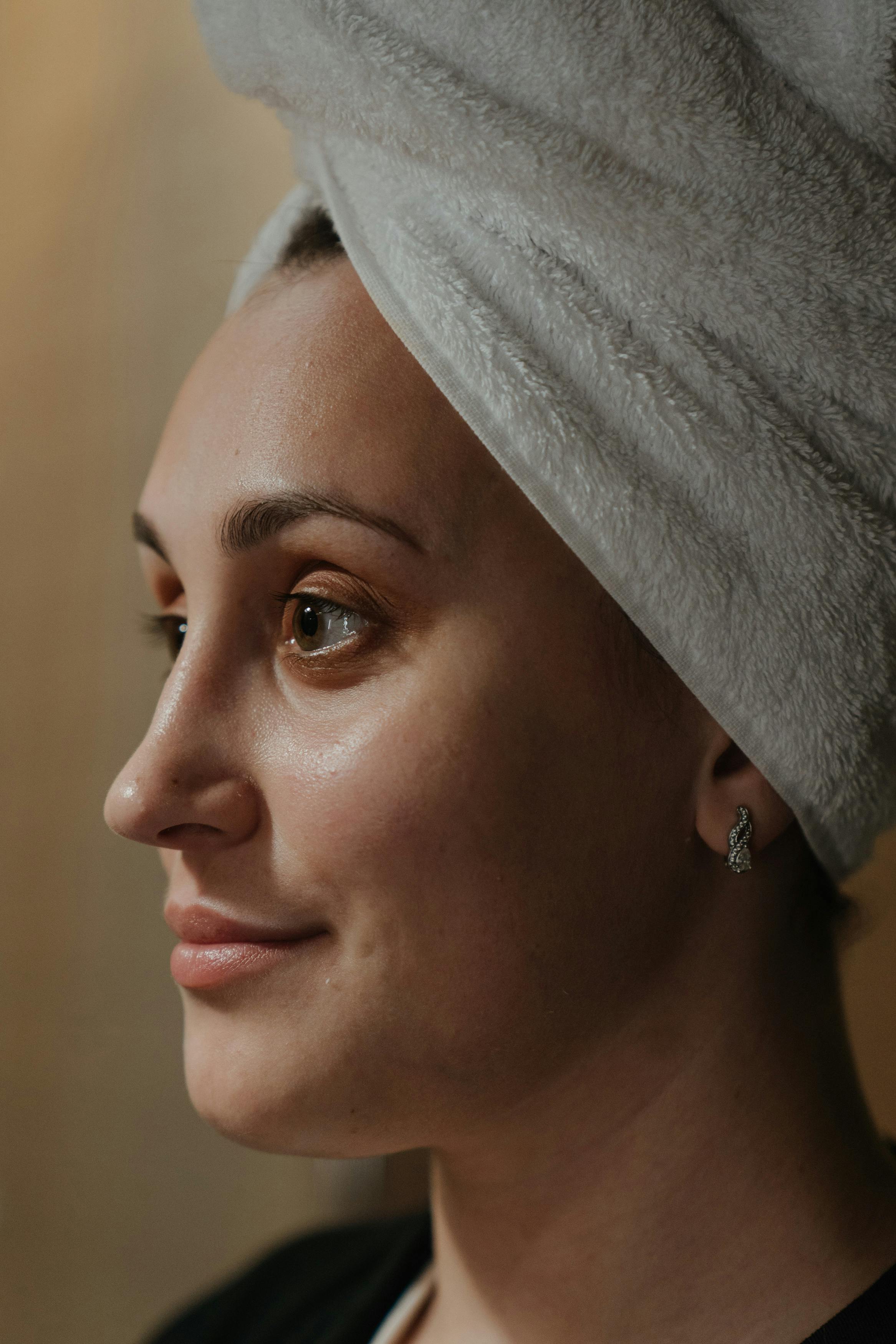 A woman with a towel on her head | Source: Pexels