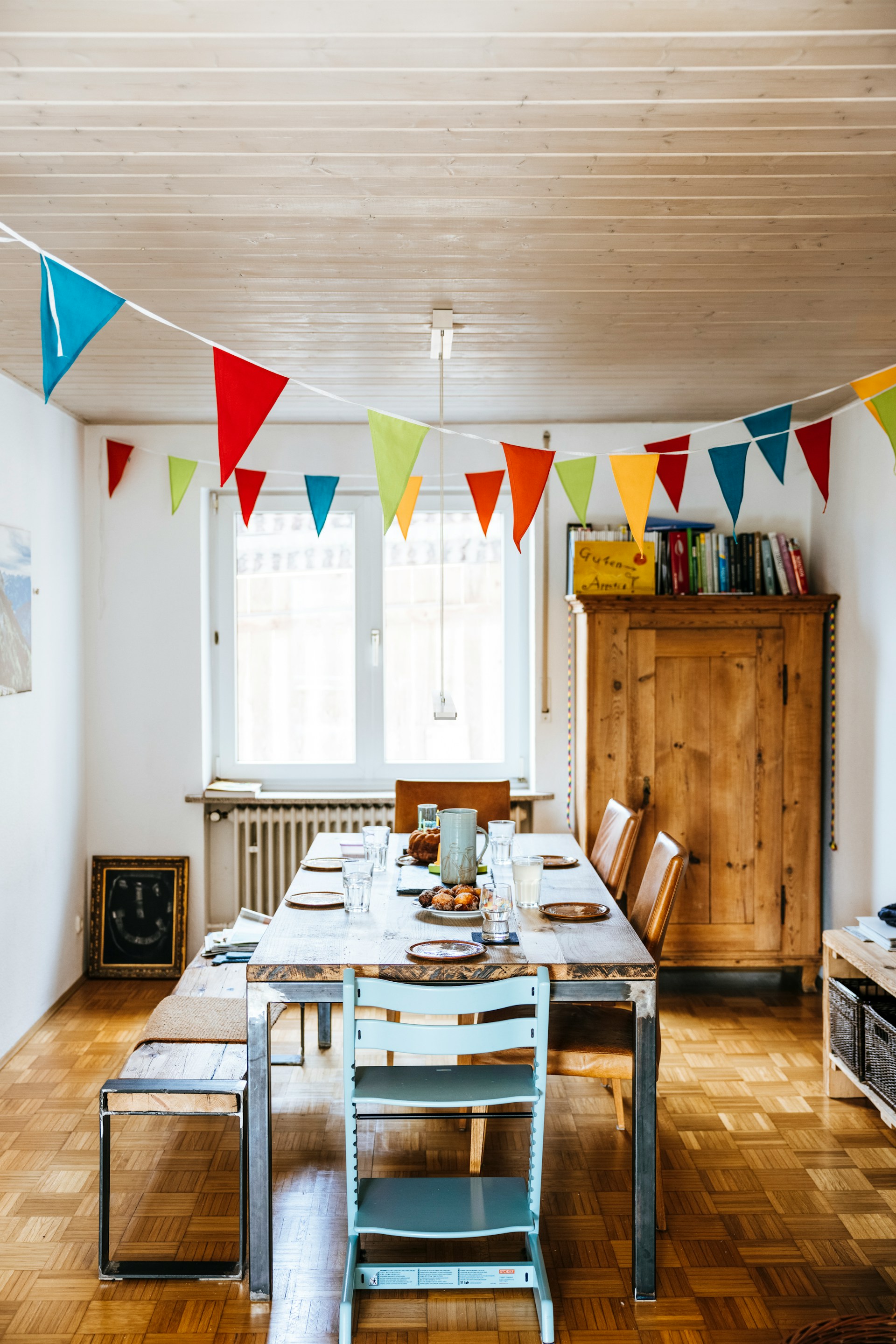 A dining room decorated with bunting | Source: Unsplash