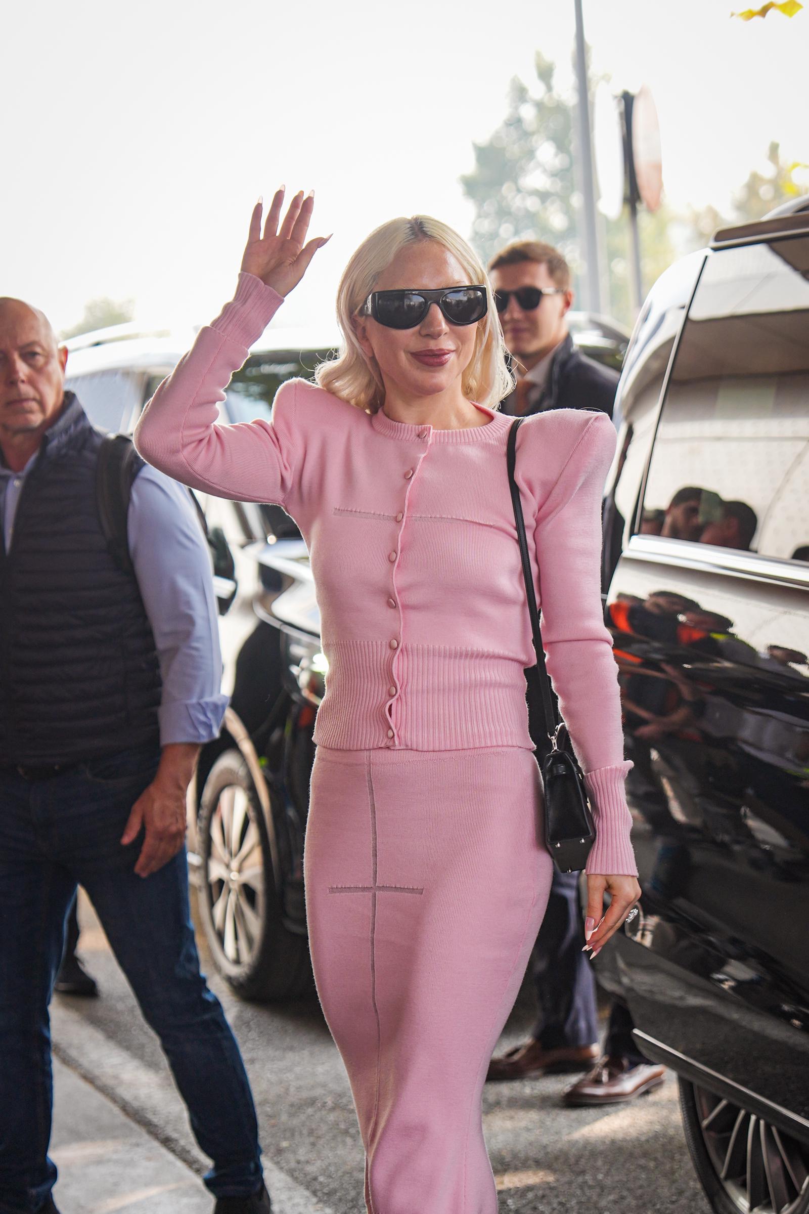 Lady Gaga arrives at Milan airport after 2 days of the filming of "The Devil Wears Prada 2" on October 11, 2025 in Milan, Italy. | Source: Getty Images