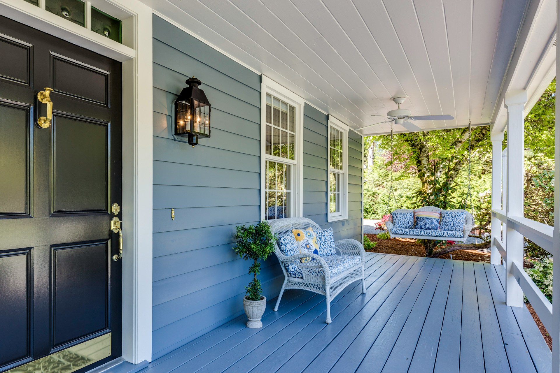 Cozy seating on a porch | Source: Unsplash