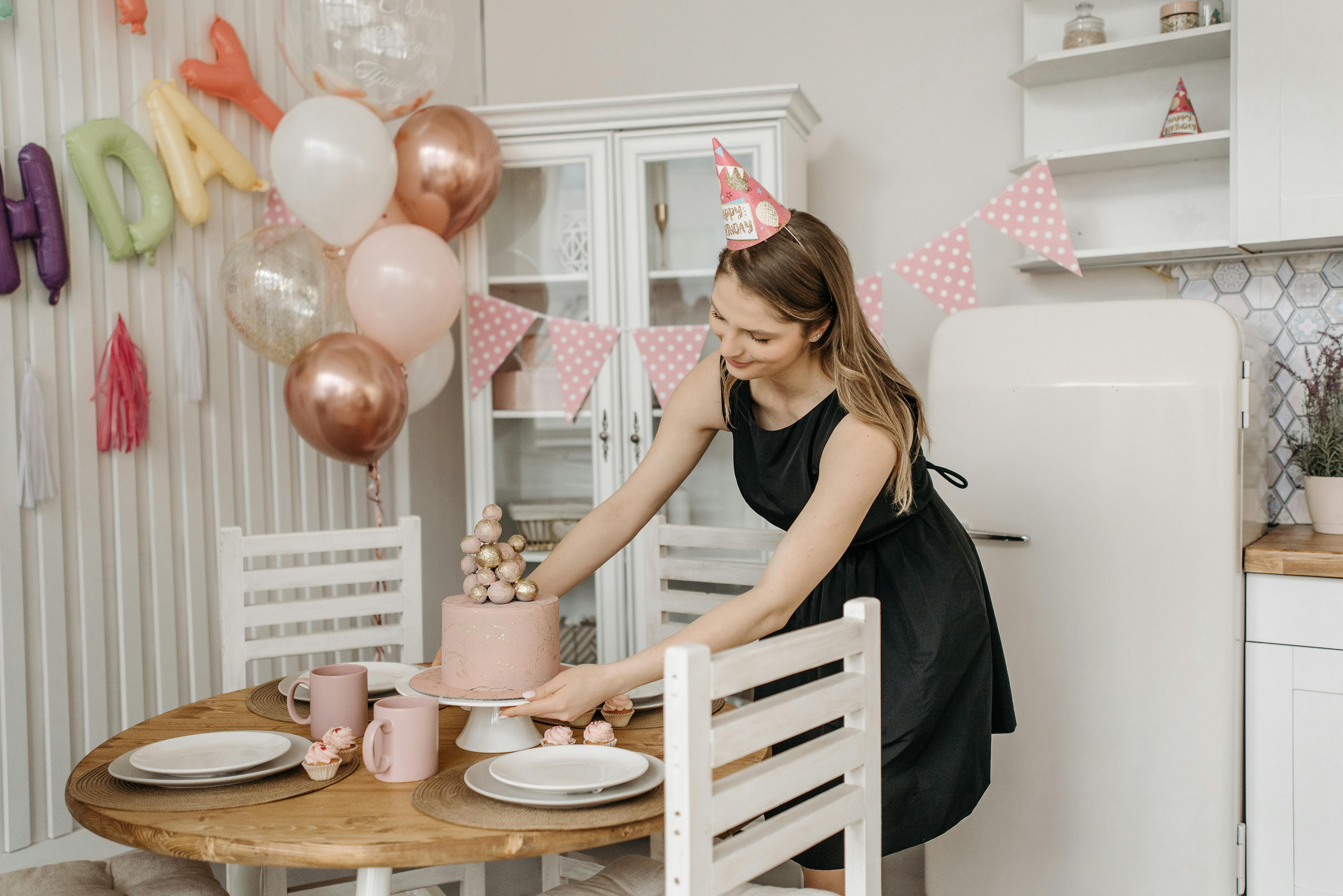 A woman preparing for a birthday party | Source: Pexels