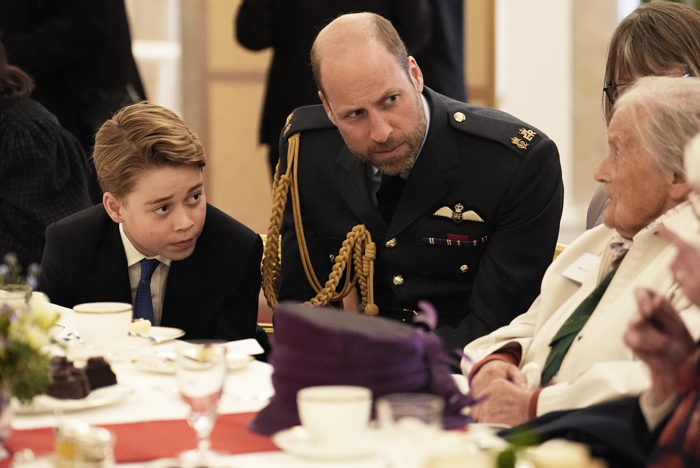 Prince William, Prince of Wales, and Prince George join Second World War veterans at a tea party in Buckingham Palace following the military procession to mark the 80th anniversary of VE Day on May 5, 2025, in London, England. | Source: Getty Images