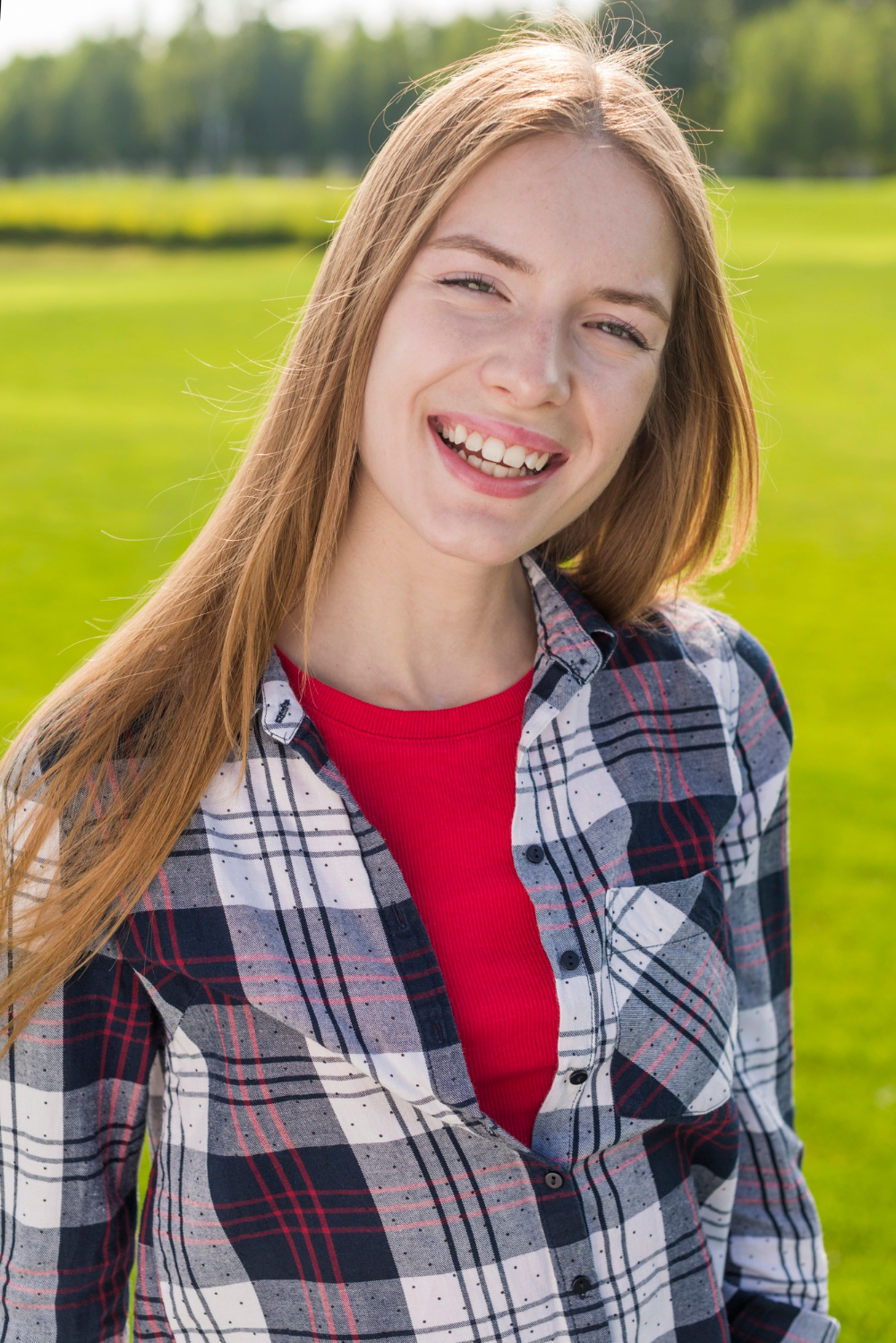 A girl smiling | Source: Freepik