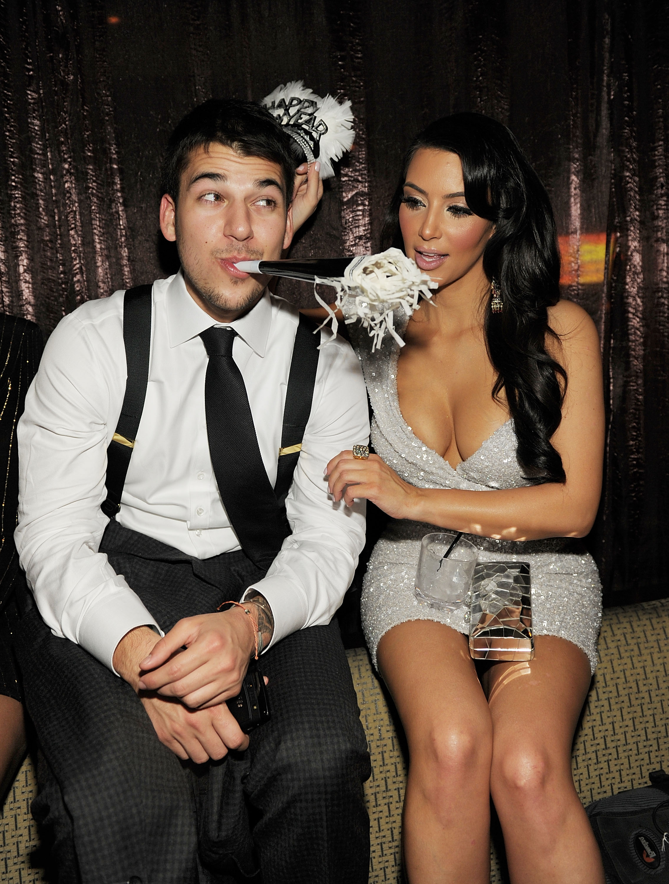 Rob Kardashian and Kim Kardashian celebrate New Years Day at TAO Nightclub at the Venetian on December 31, 2010, in Las Vegas, Nevada. | Source: Getty Images