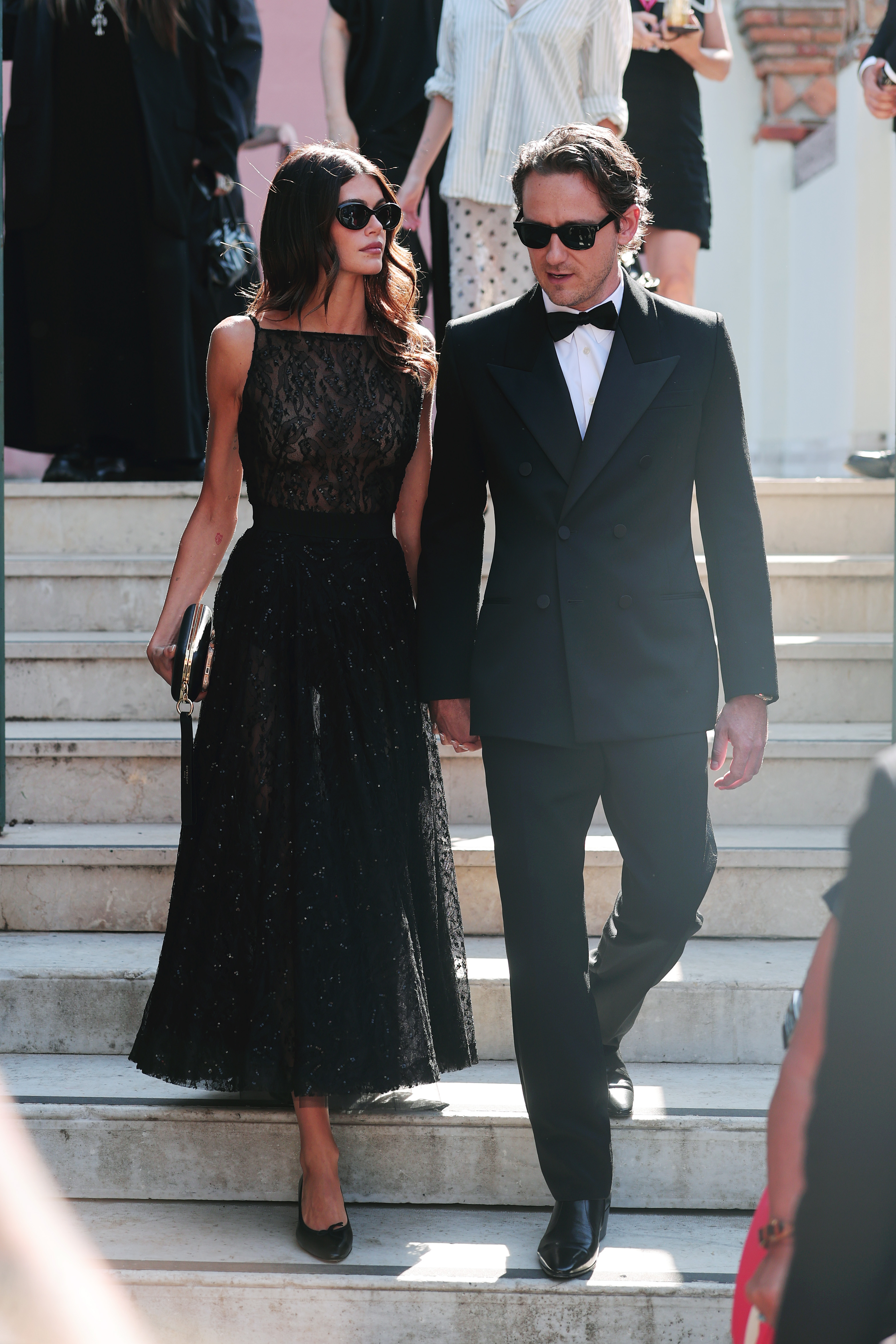 Kaia Gerber and Lewis Pullman depart from Hotel Excelsior during the 82nd Venice International Film Festival on September 1, 2025, in Venice, Italy. | Source: Getty Images