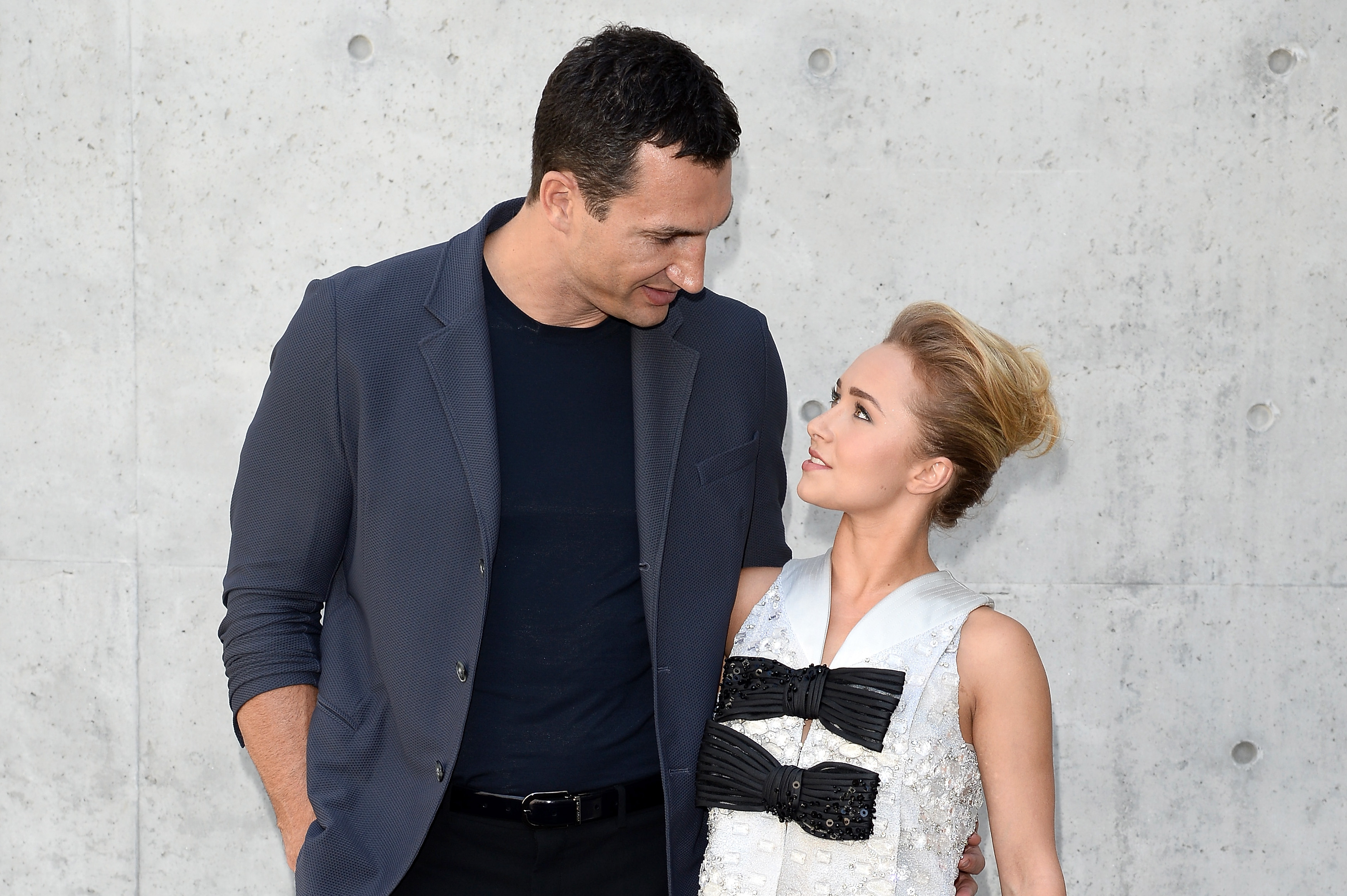 Wladimir Klitschko and Hayden Panettiere attend the Giorgio Armani show during Milan Menswear Fashion Week Spring Summer 2014 on June 25, 2013 in Milan, Italy. | Source: Getty Images