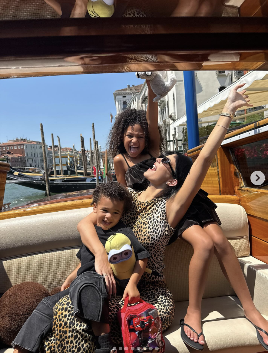 Kylie Jenner poses with her children, Aire and Stormi, In Venice, Italy, posted on June 29, 2025 | Source: Instagram/kyliejenner