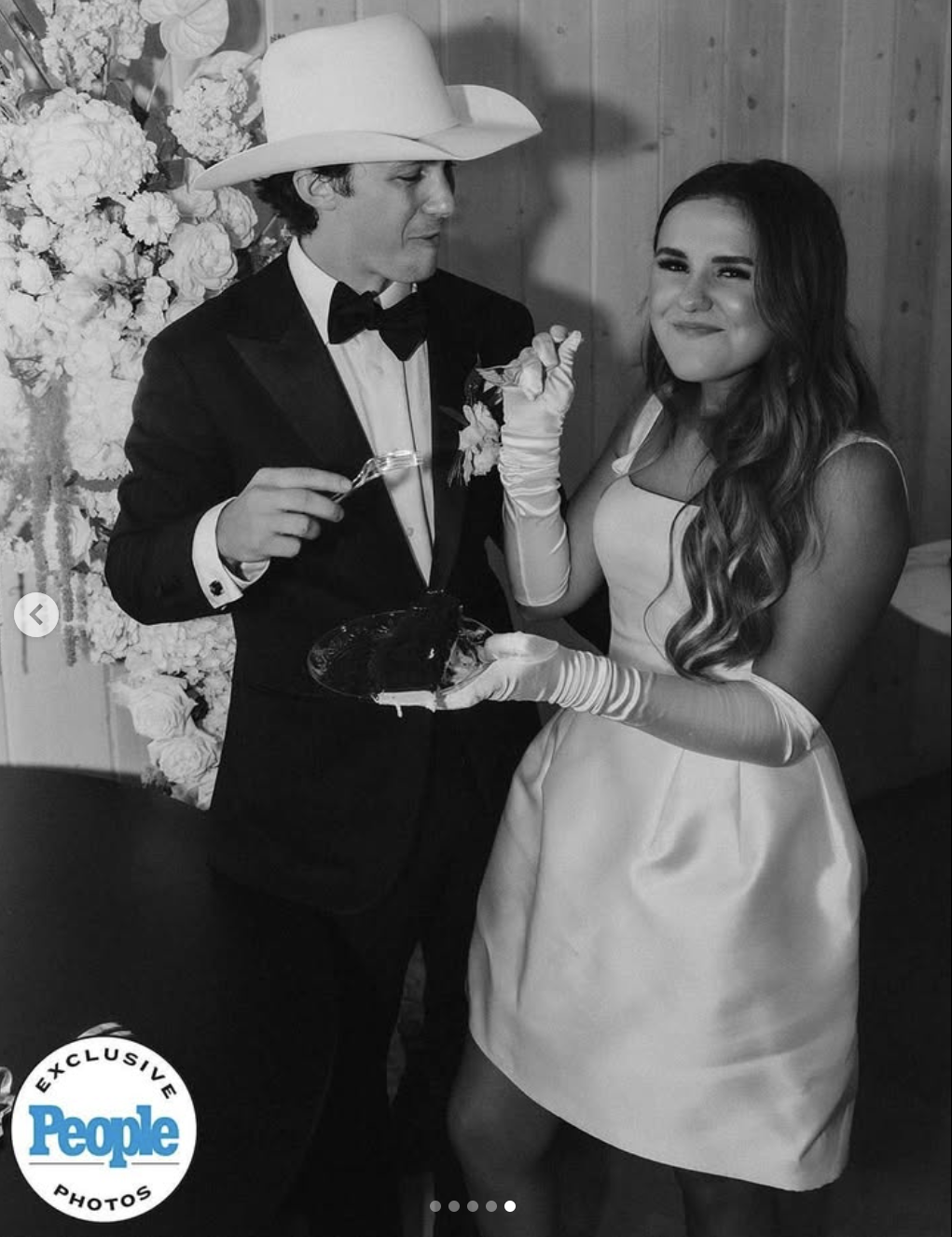 The newlyweds eating cake during their wedding reception, posted on June 22, 2025 | Source: Instagram/People