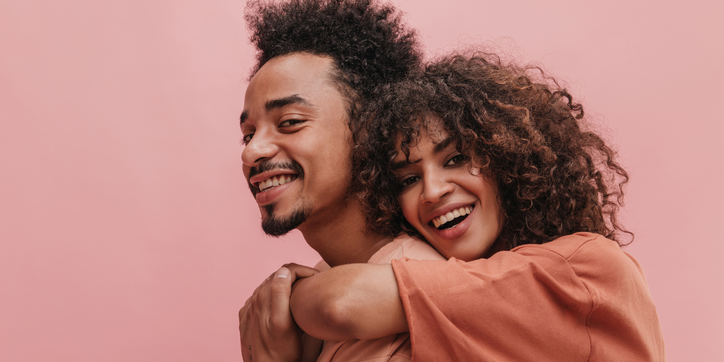A couple embracing | Source: Shutterstock