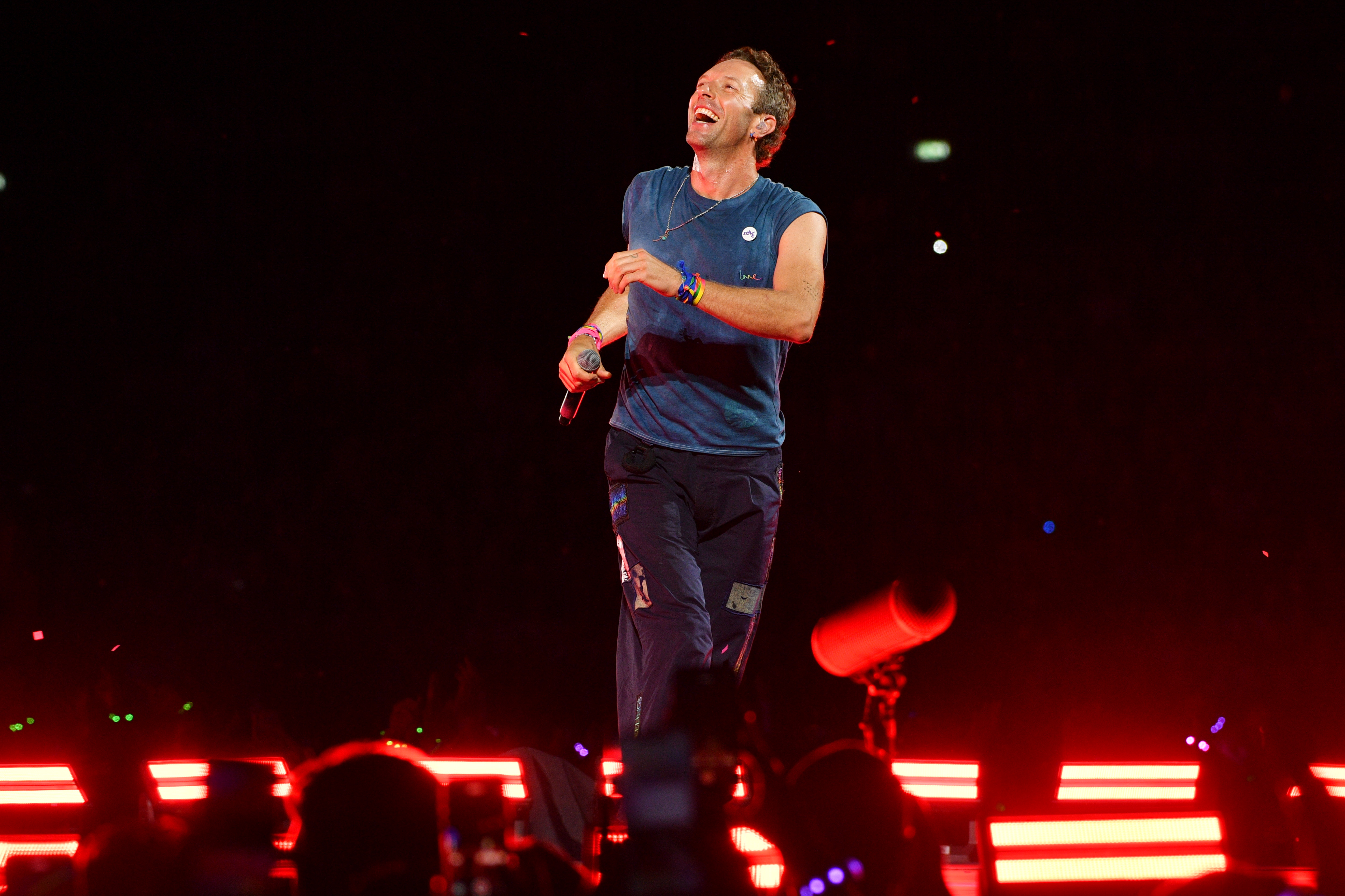 Chris Martin of Coldplay performs during the 'Music Of The Spheres World Tour' at Wembley Stadium on August 22, 2025 in London, England. | Source: Getty Images