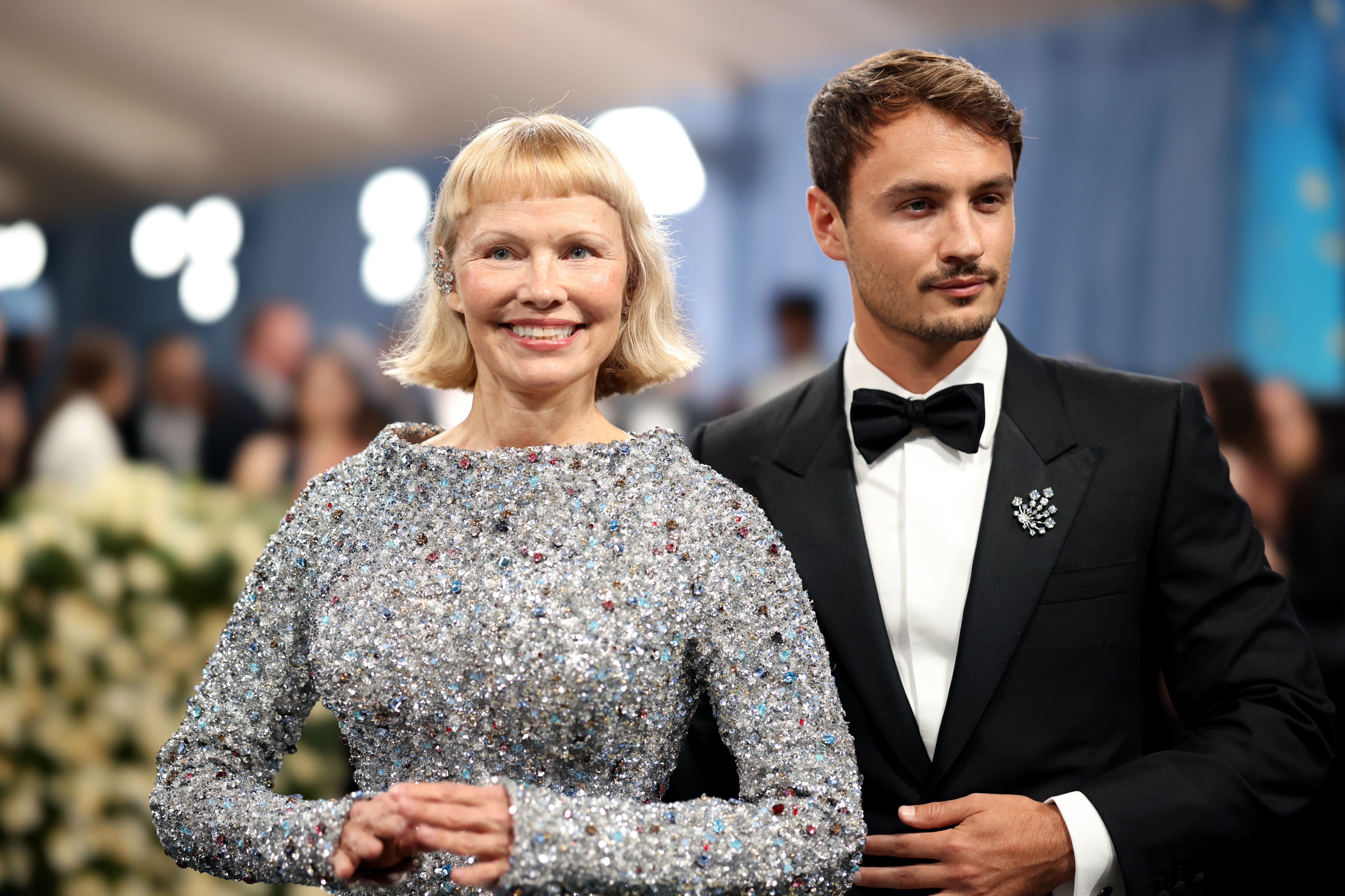 Pamela Anderson and Brandon Thomas Lee attend the 2025 Met Gala Celebrating "Superfine: Tailoring Black Style" at Metropolitan Museum of Art on May 5, 2025, in New York City. | Source: Getty Images