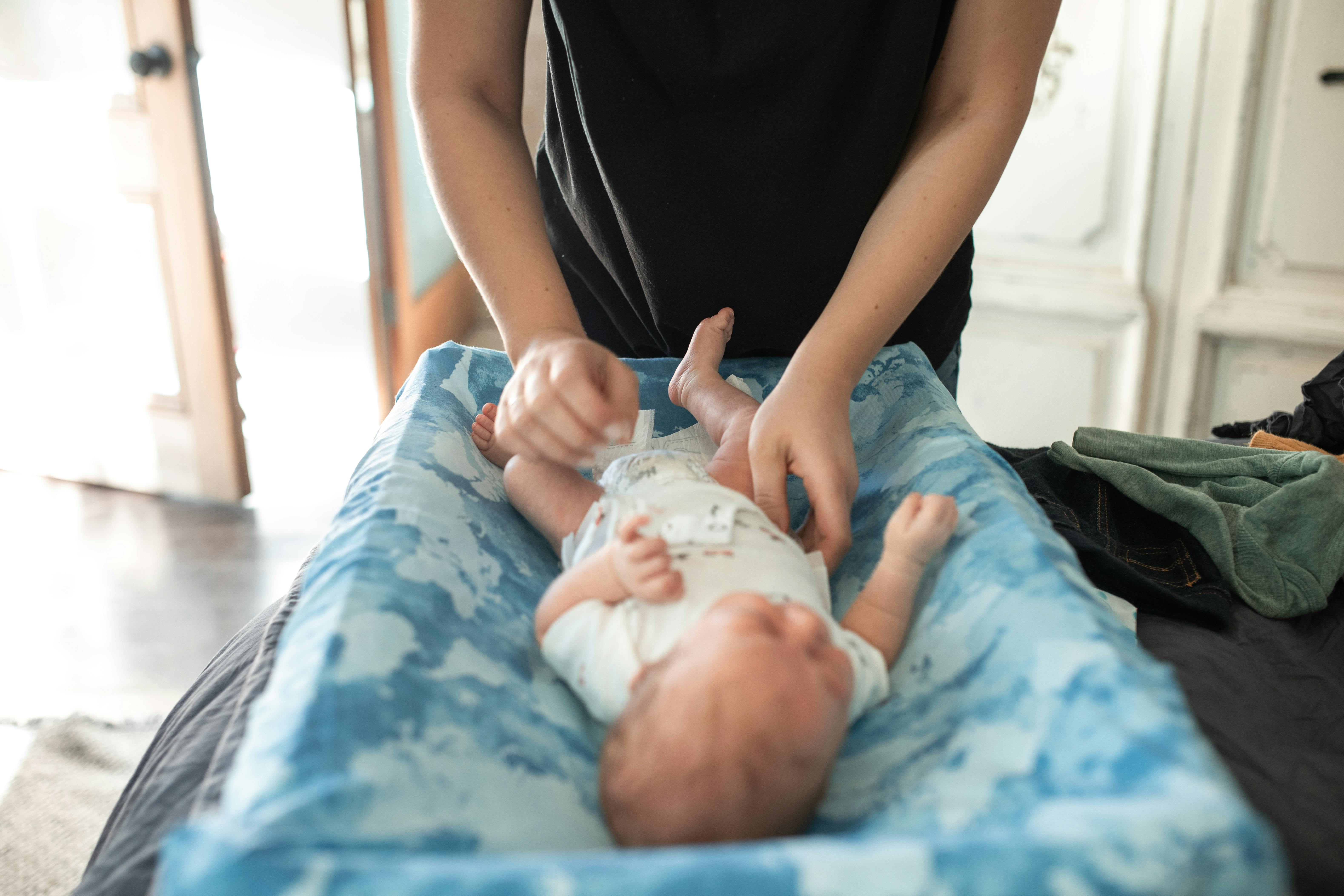 A person holding a baby | Source: Pexels