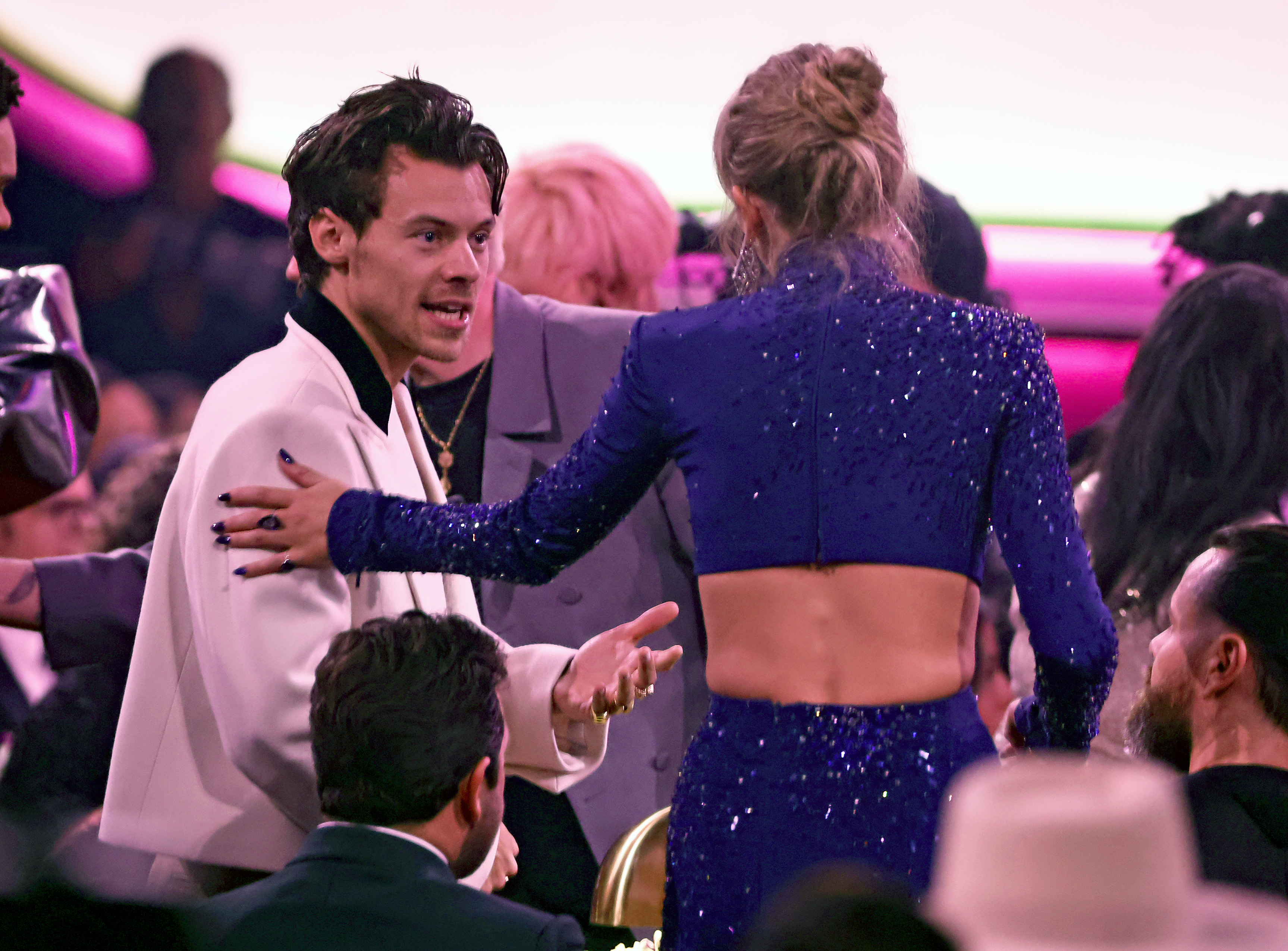 Harry Styles and Taylor Swift speak during the 65th GRAMMY Awards at Crypto.com Arena on February 05, 2023 in Los Angeles, California. | Source: Getty Images
