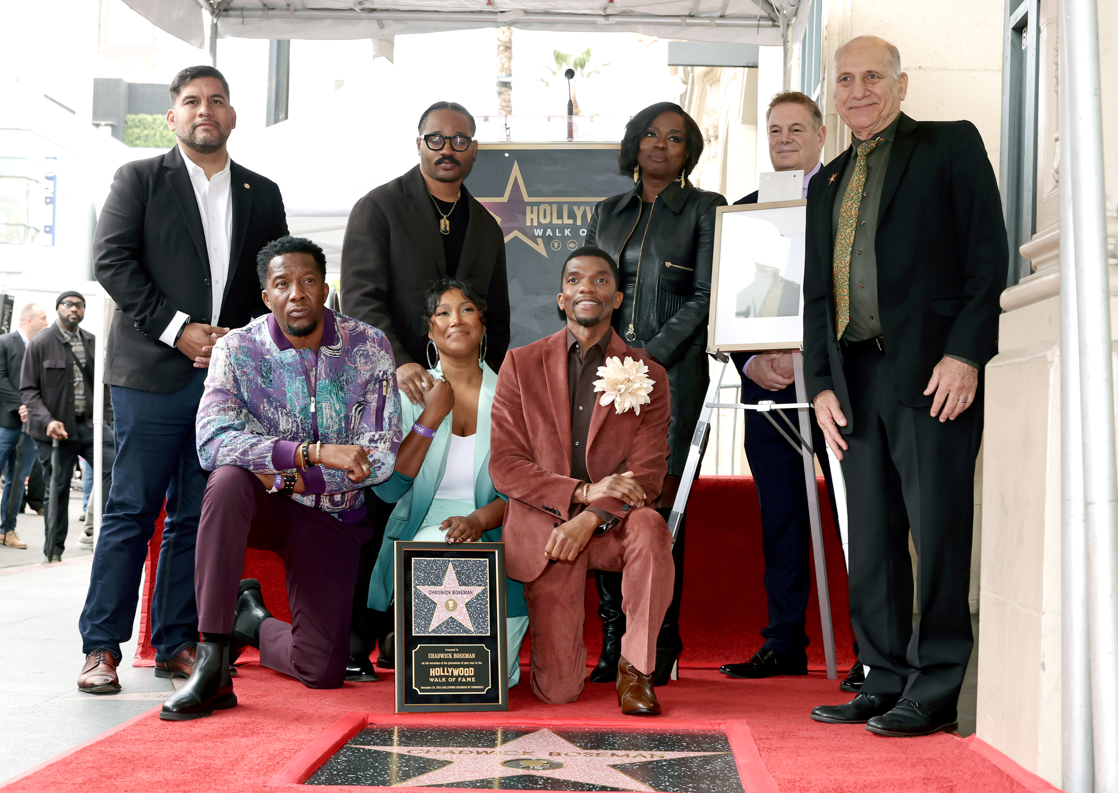 Hugo Soto-Martínez, Derrick Boseman, Ryan Coogler, Taylor Simone Ledward, Kevin Boseman, Viola Davis, Jerry Neuman, Hollywood Chamber of Commerce chairman of the board and Steven Nissen, President & CEO, Hollywood Chamber of Commerce attend as Actor Chadwick Boseman is honored with a Posthumous Star on the Hollywood Walk of Fame on November 20, 2025 in Hollywood, California. | Source: Getty Images