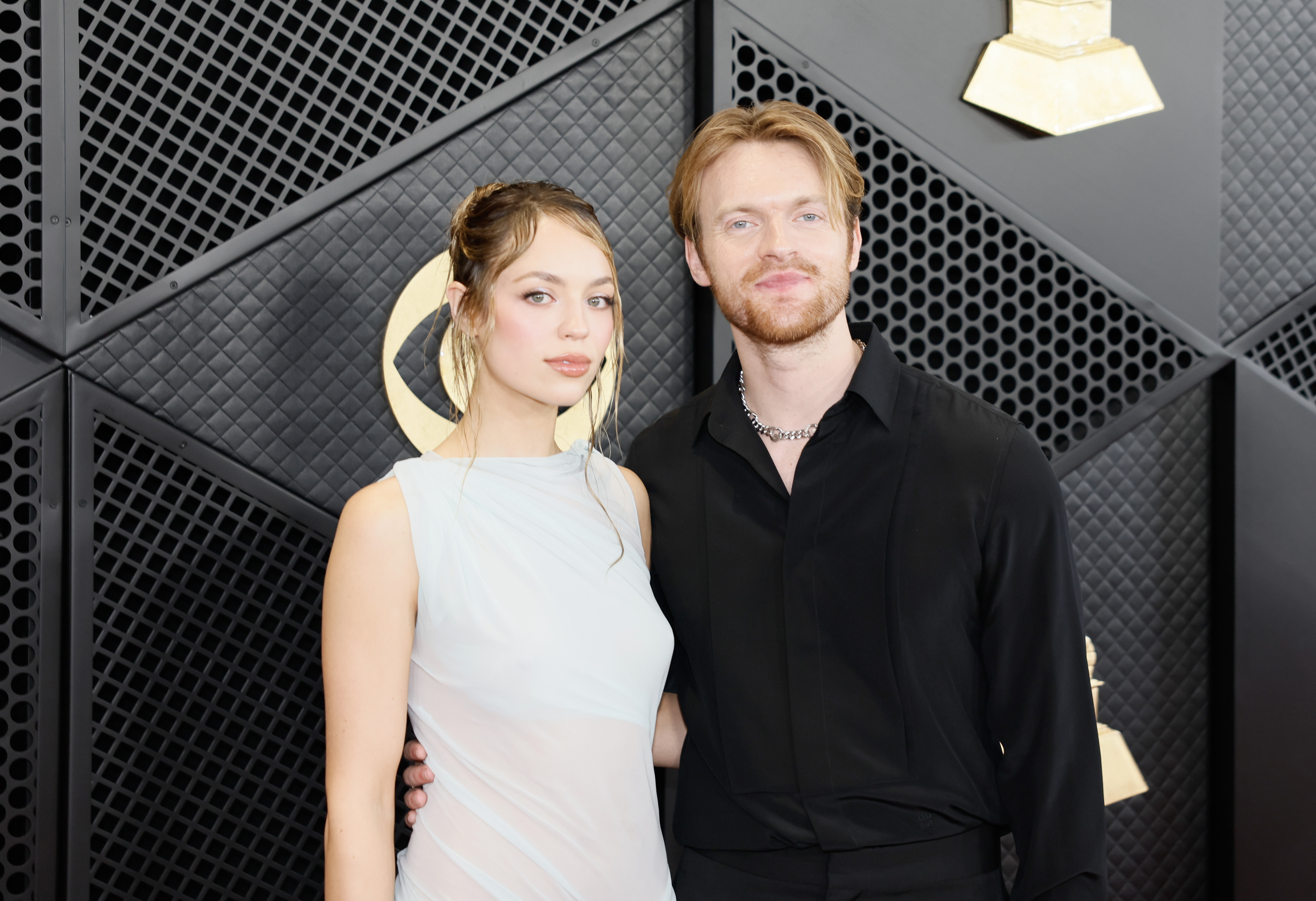 Claudia Sulewski and Finneas arrive on the Red Carpet at the Crypto.com Arena on February 4, 2024, in Los Angeles, California. | Source: Getty Images