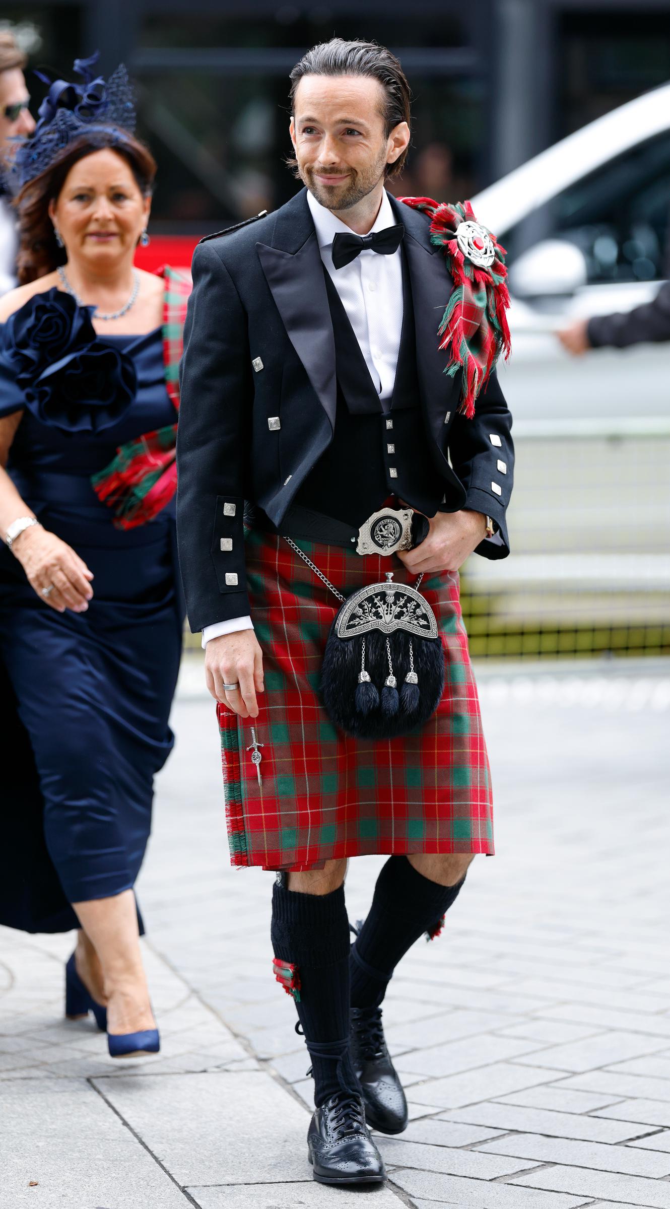 Rory McPhee and Mel B depart following their wedding in the OBE (Order of the British Empire) Chapel at St Paul's Cathedral on July 5, 2025, in London, England. | Source: Getty Images