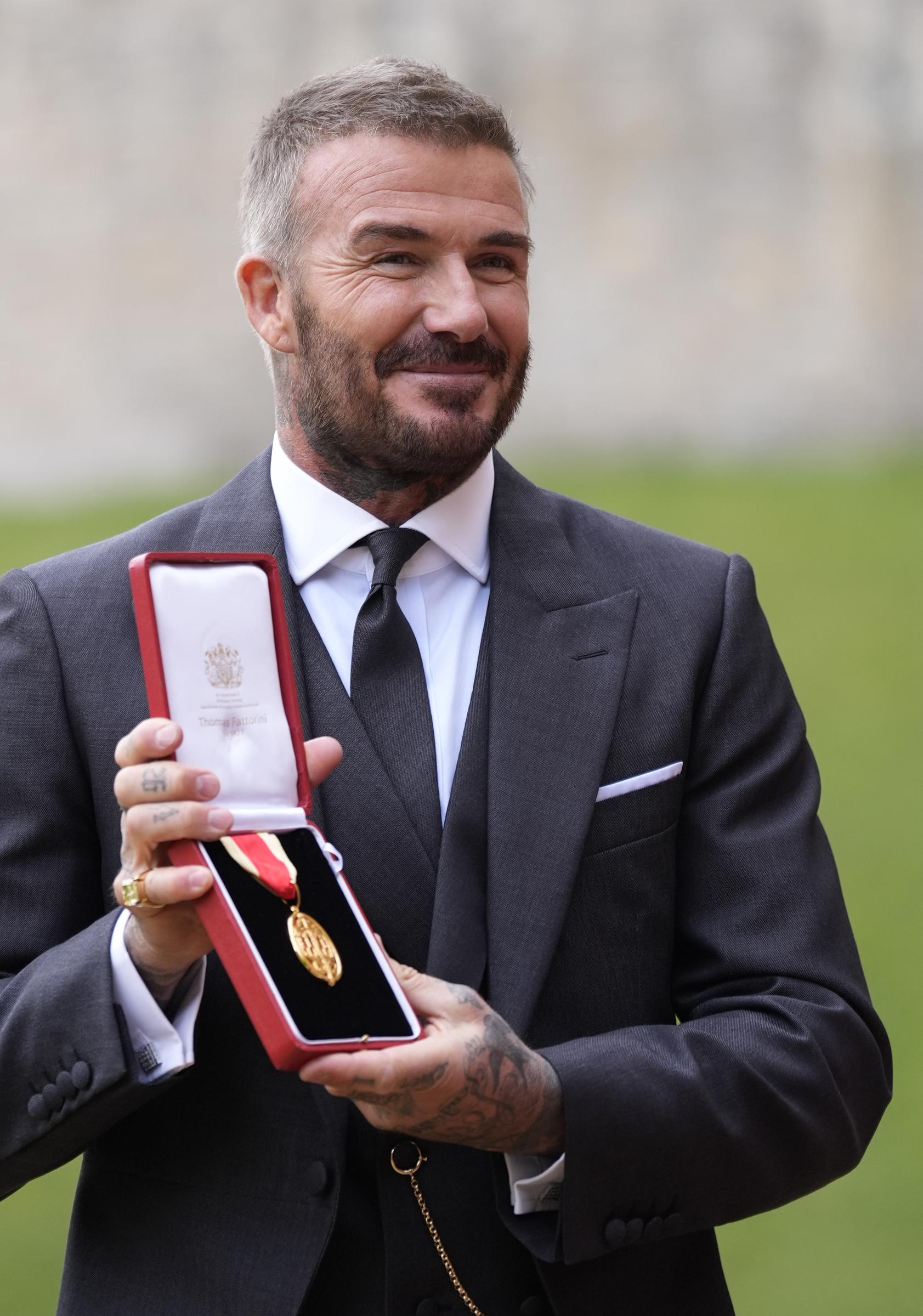 Sir David Beckham poses after he was made a Knight Bachelor at an investiture ceremony at Windsor Castle on November 4, 2025, in Windsor, England. | Source: Getty Images