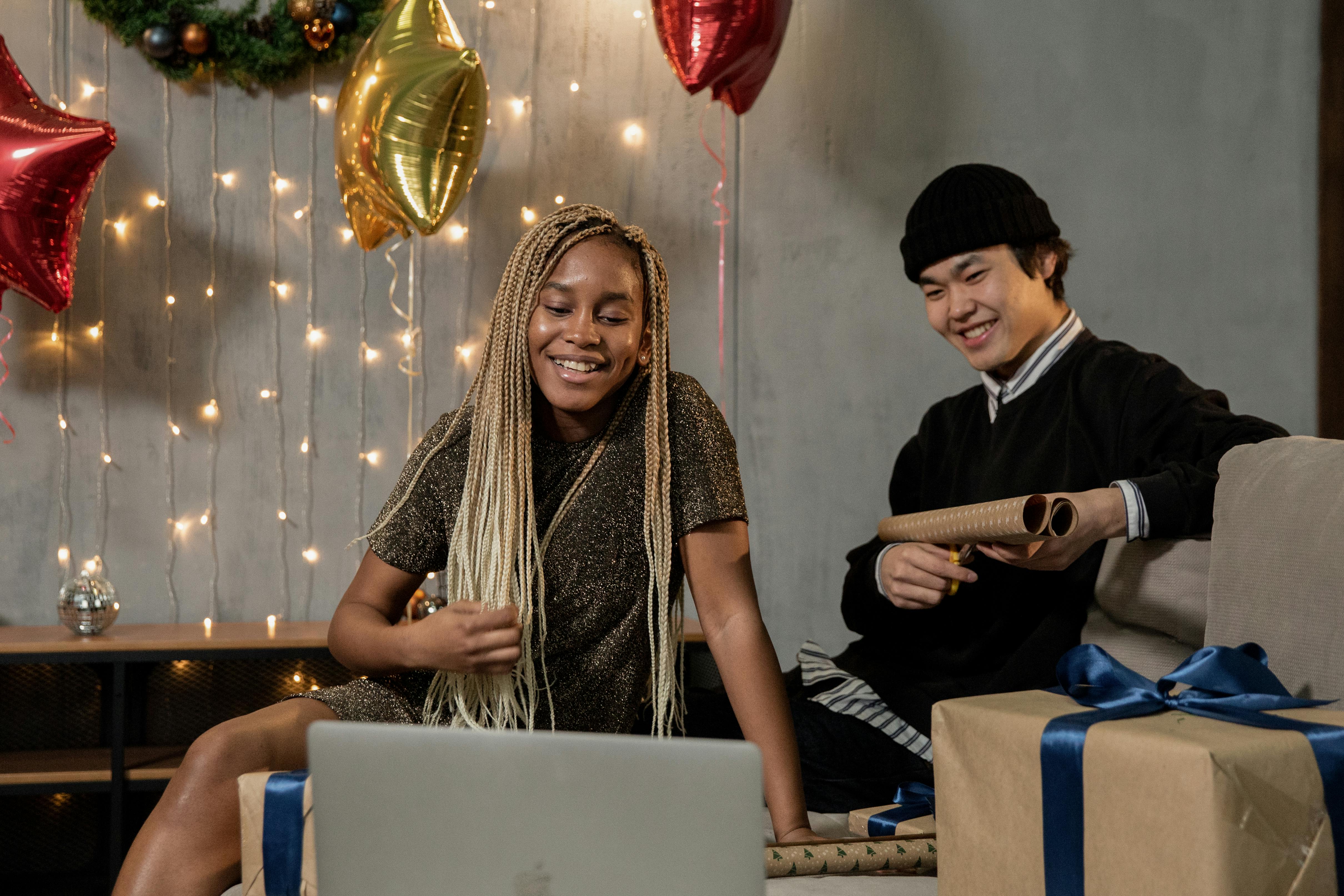 A couple surrounded by gifts | Source: Pexels