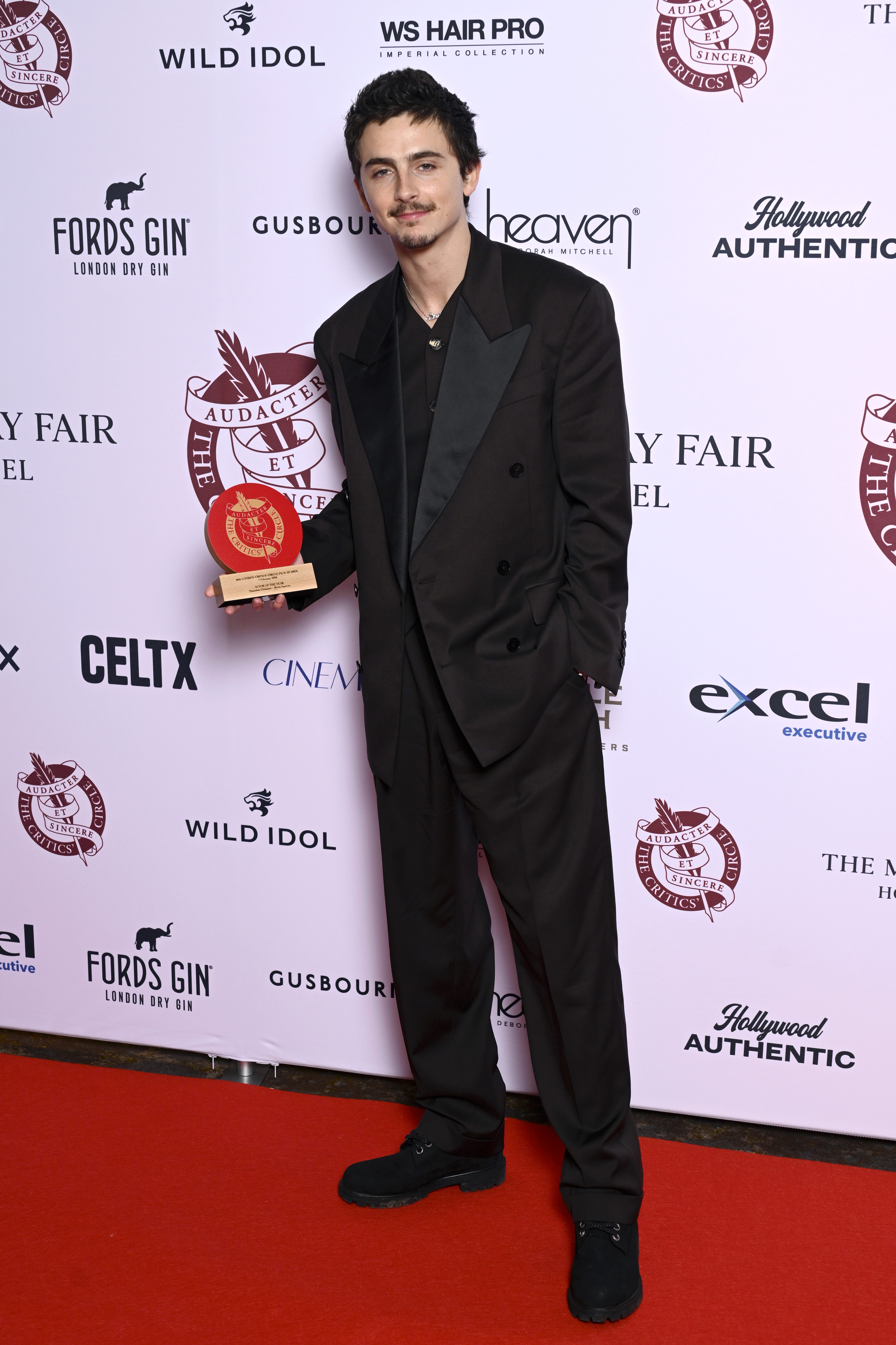 Timothée Chalamet inside the Winners Room with the Actor of the Year Award at the 46th Critics' Circle Film Awards at The May Fair Hotel on February 01, 2026 in London, England. | Source: Getty Images